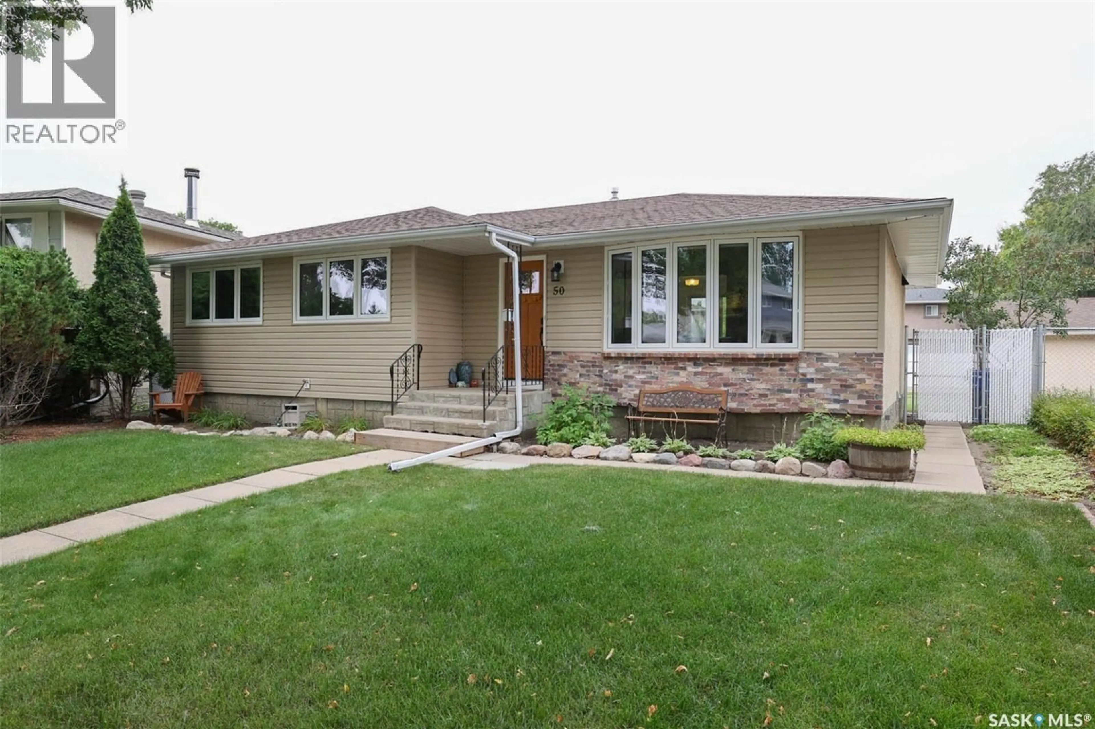 Home with vinyl exterior material, street for 50 SELBY CRESCENT, Regina Saskatchewan S4T6W1