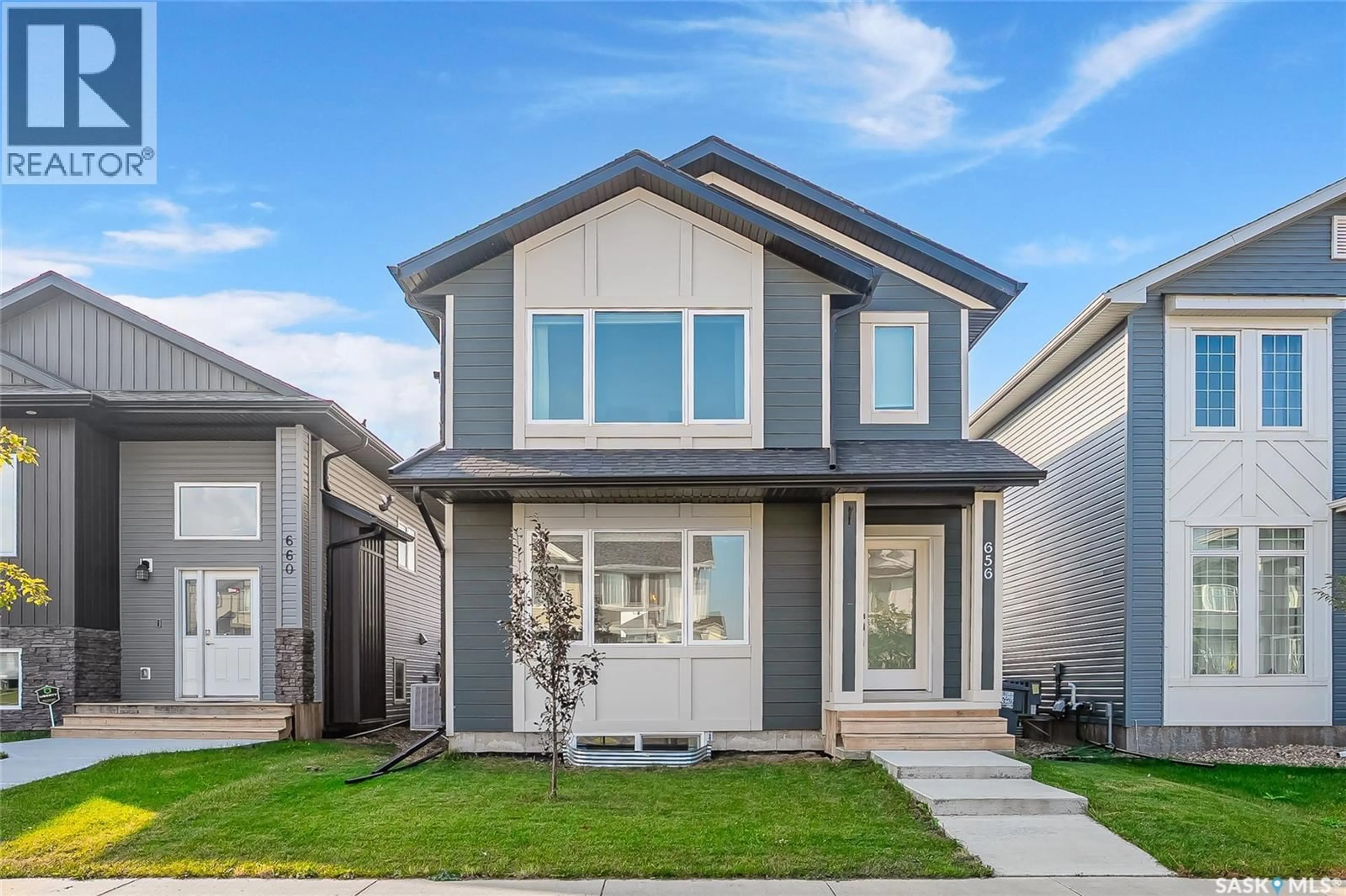 Home with vinyl exterior material, street for 656 FEHEREGYHAZI BOULEVARD, Saskatoon Saskatchewan S7W1C4