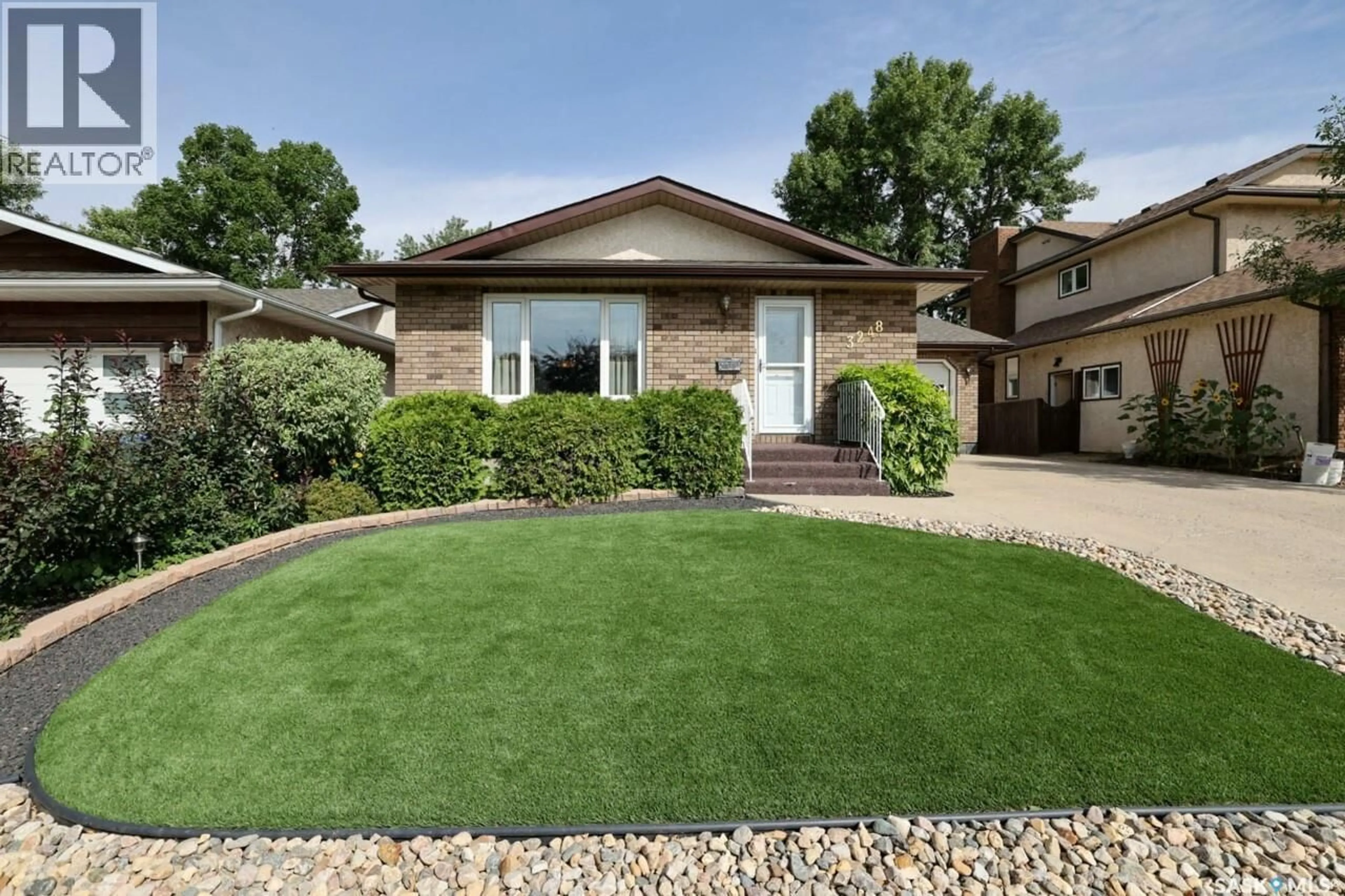 Home with vinyl exterior material, street for 3248 MACLACHLAN CRESCENT, Regina Saskatchewan S4R8H5