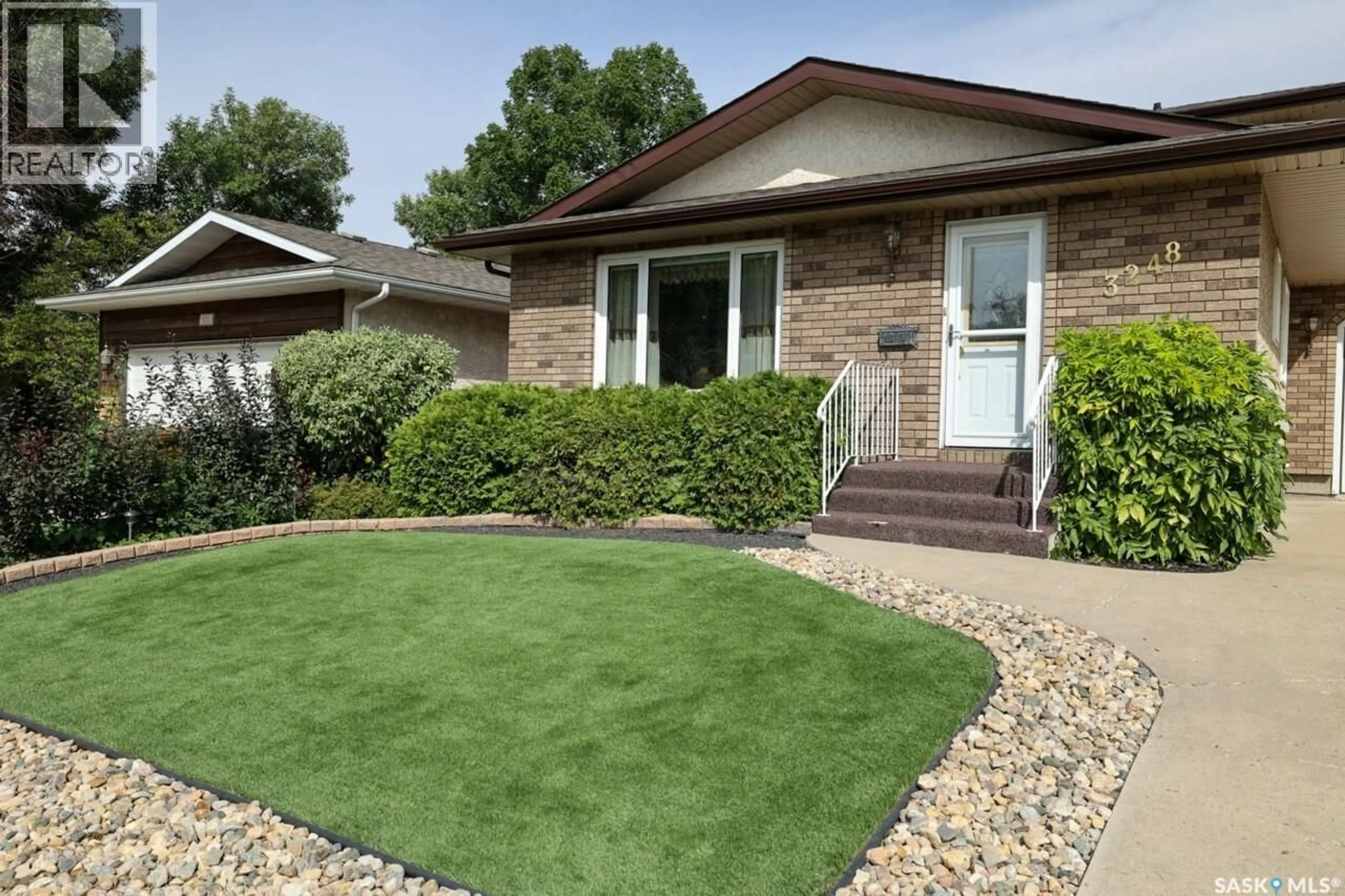 Home with vinyl exterior material, street for 3248 MACLACHLAN CRESCENT, Regina Saskatchewan S4R8H5