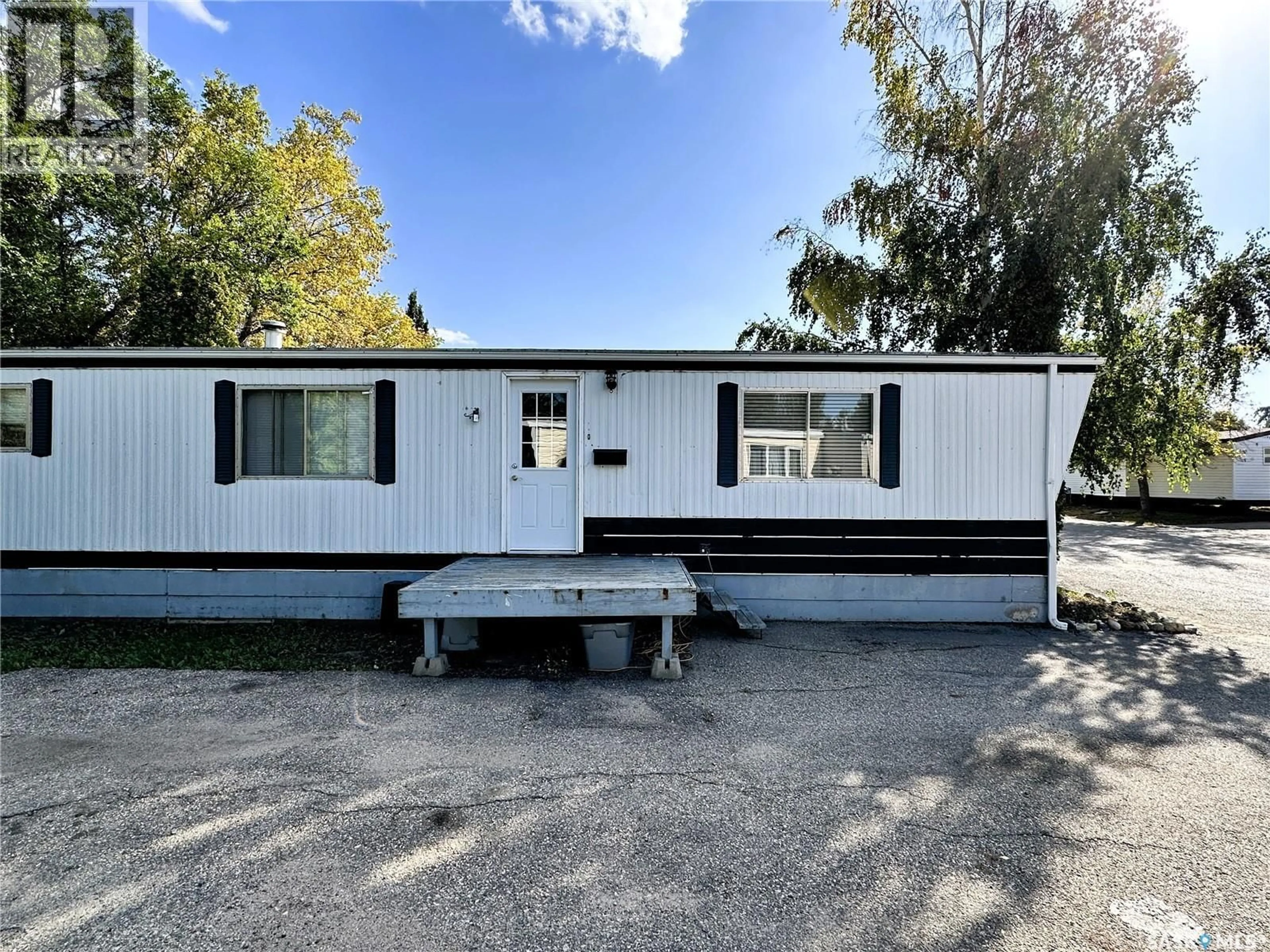 Home with vinyl exterior material, street for 38 - 1035 BOYCHUK DRIVE, Saskatoon Saskatchewan S7H5B2