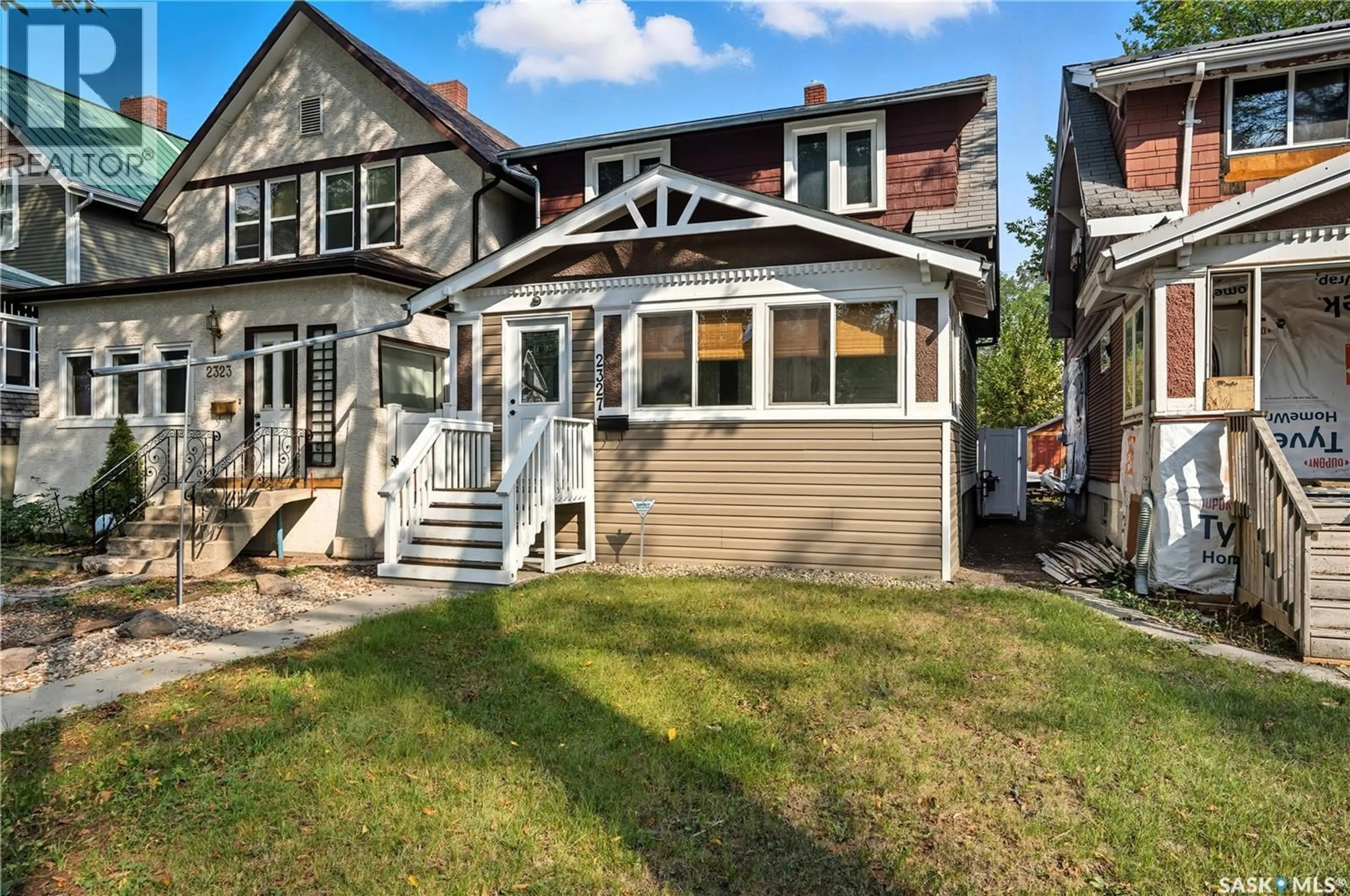 Home with vinyl exterior material, street for 2327 TORONTO STREET, Regina Saskatchewan S4P1N7