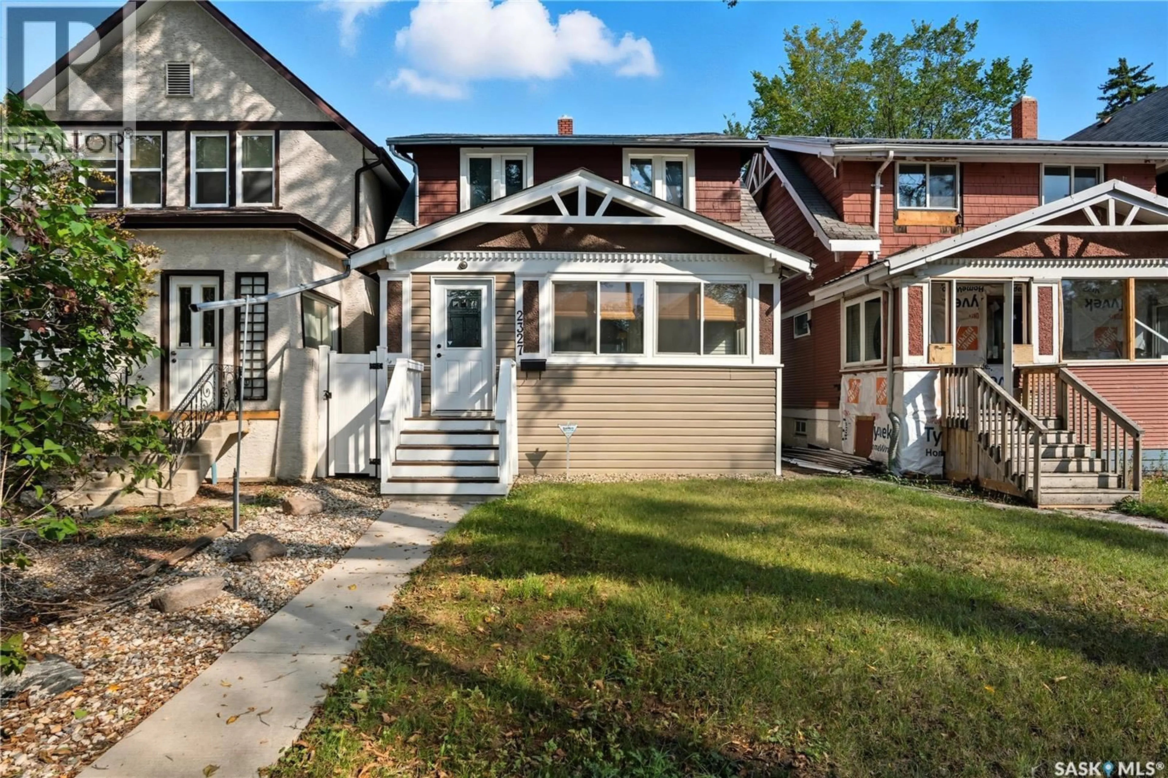 Home with vinyl exterior material, street for 2327 TORONTO STREET, Regina Saskatchewan S4P1N7