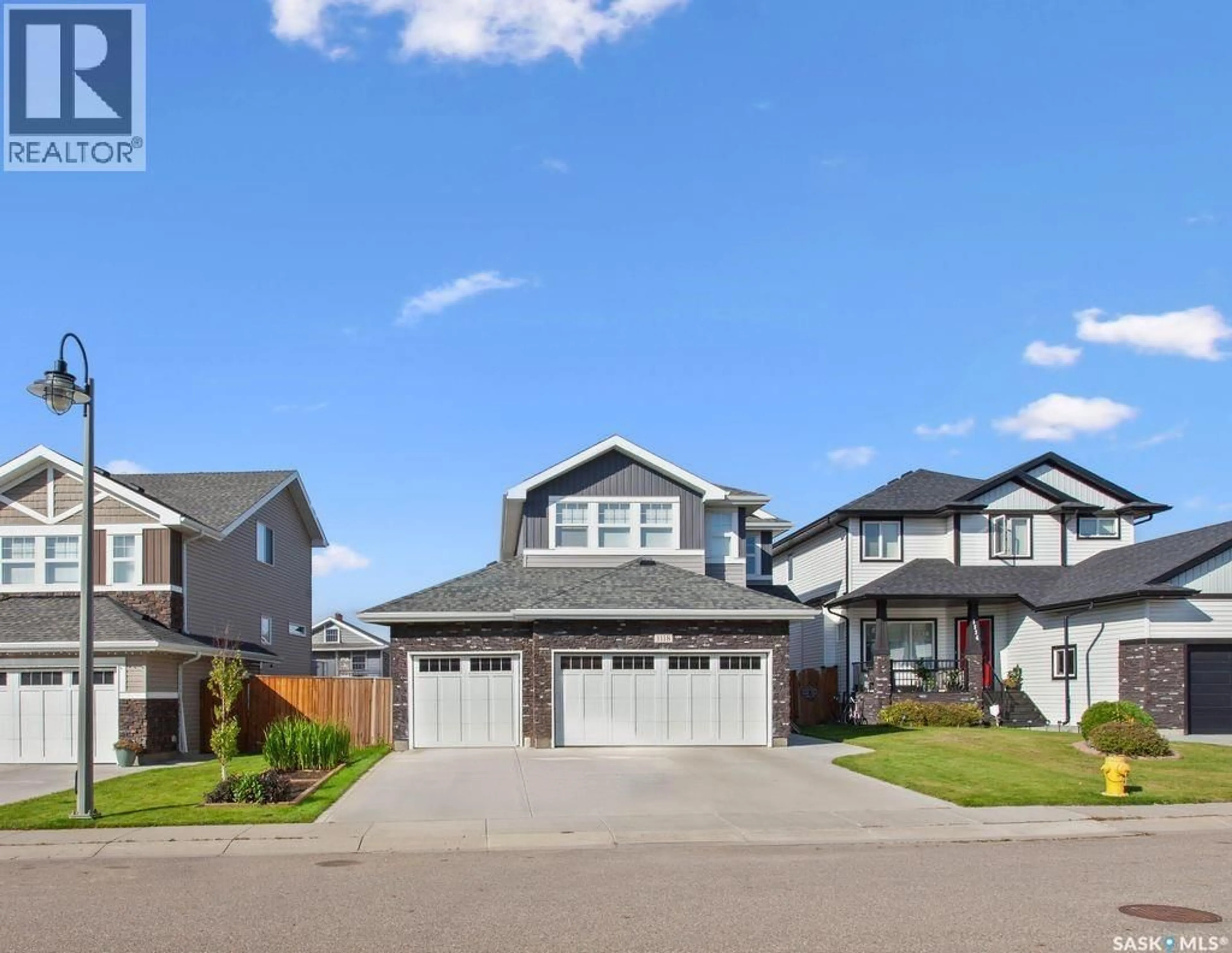 Home with vinyl exterior material, street for 1118 KOLYNCHUK LINK, Saskatoon Saskatchewan S7T0V7
