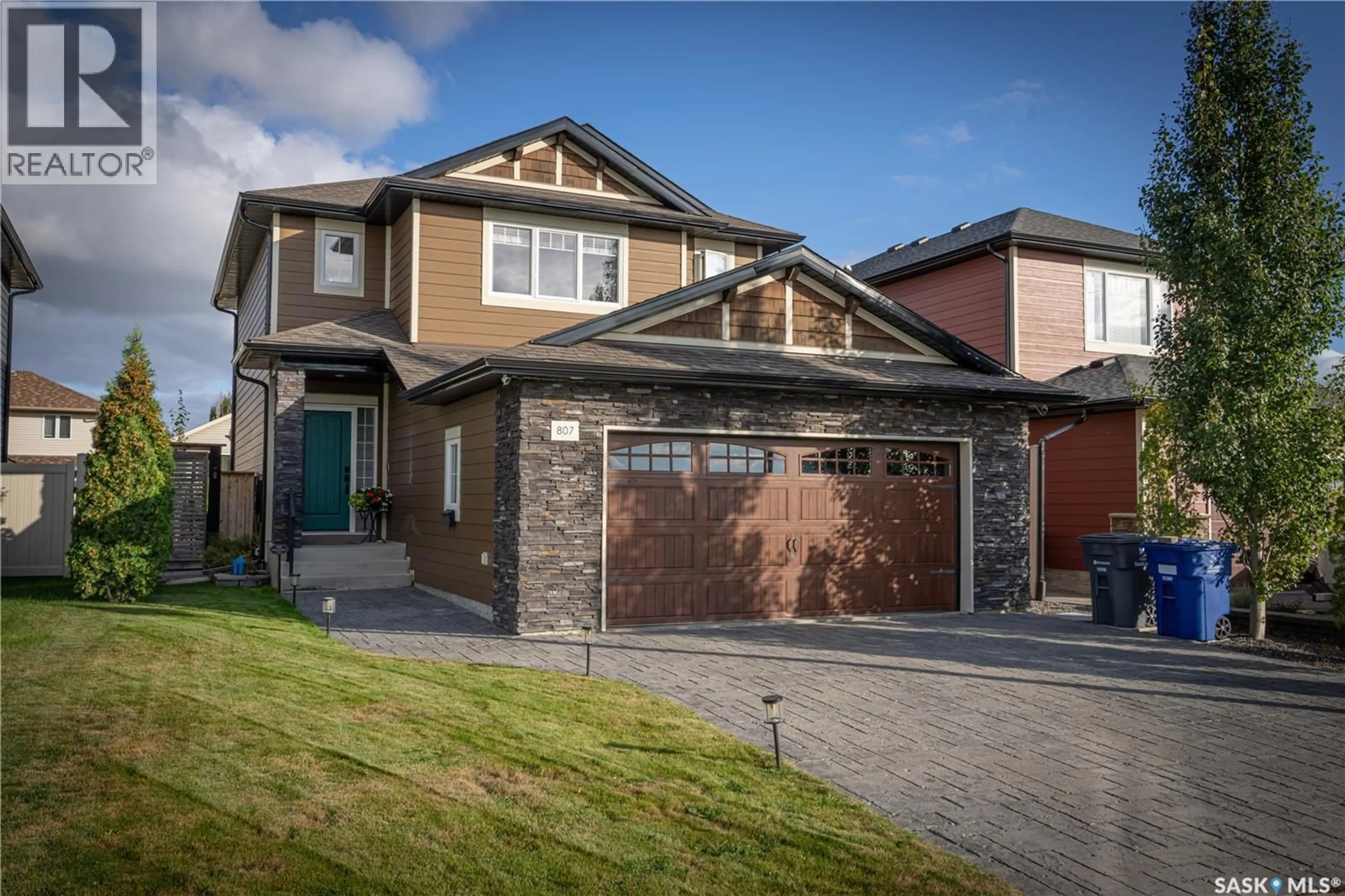 Home with brick exterior material, street for 807 LYND CRESCENT, Saskatoon Saskatchewan S7T0C5