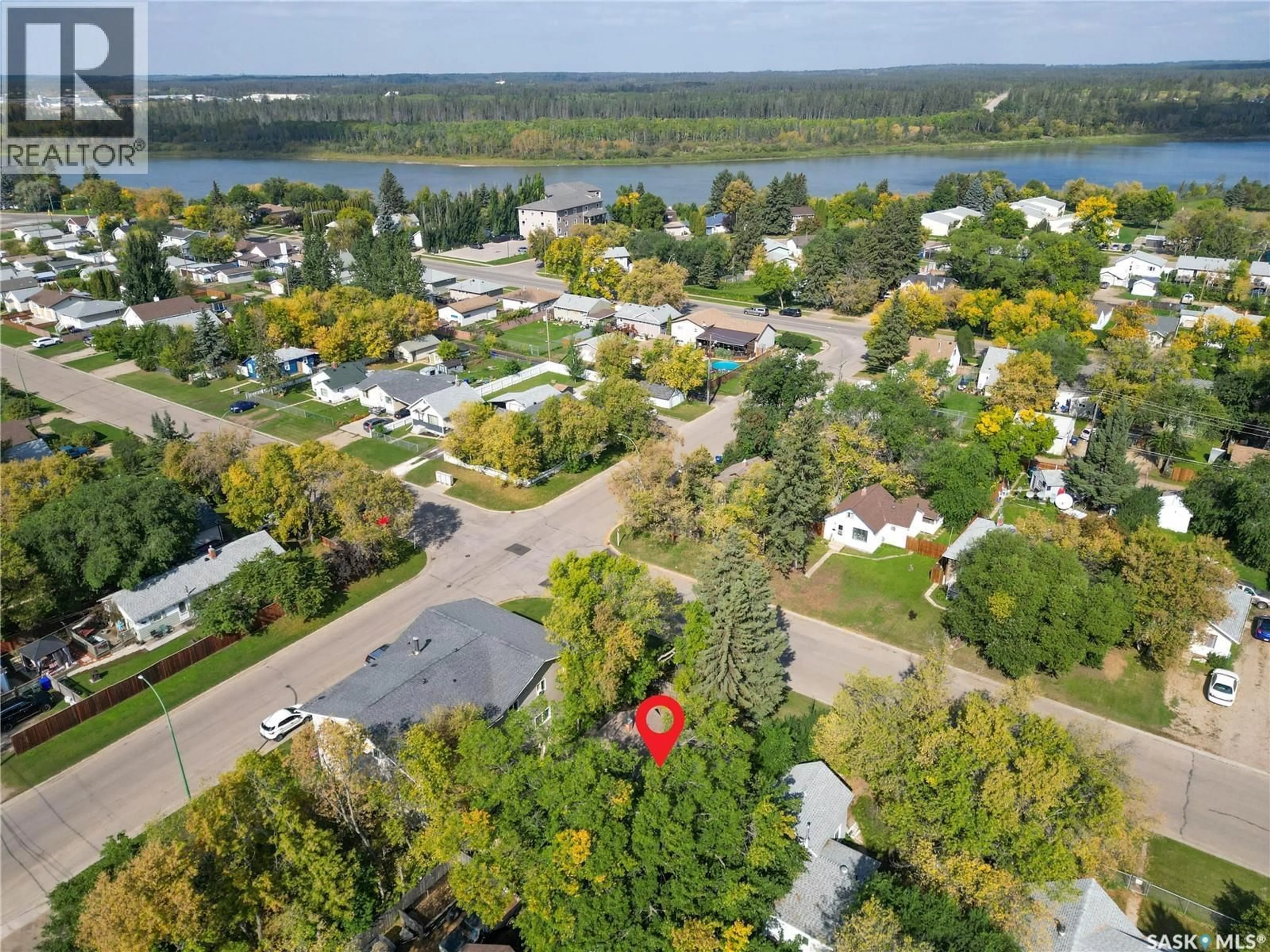 A pic from outside/outdoor area/front of a property/back of a property/a pic from drone, water/lake/river/ocean view for 707 5TH STREET, Prince Albert Saskatchewan S6V0M5