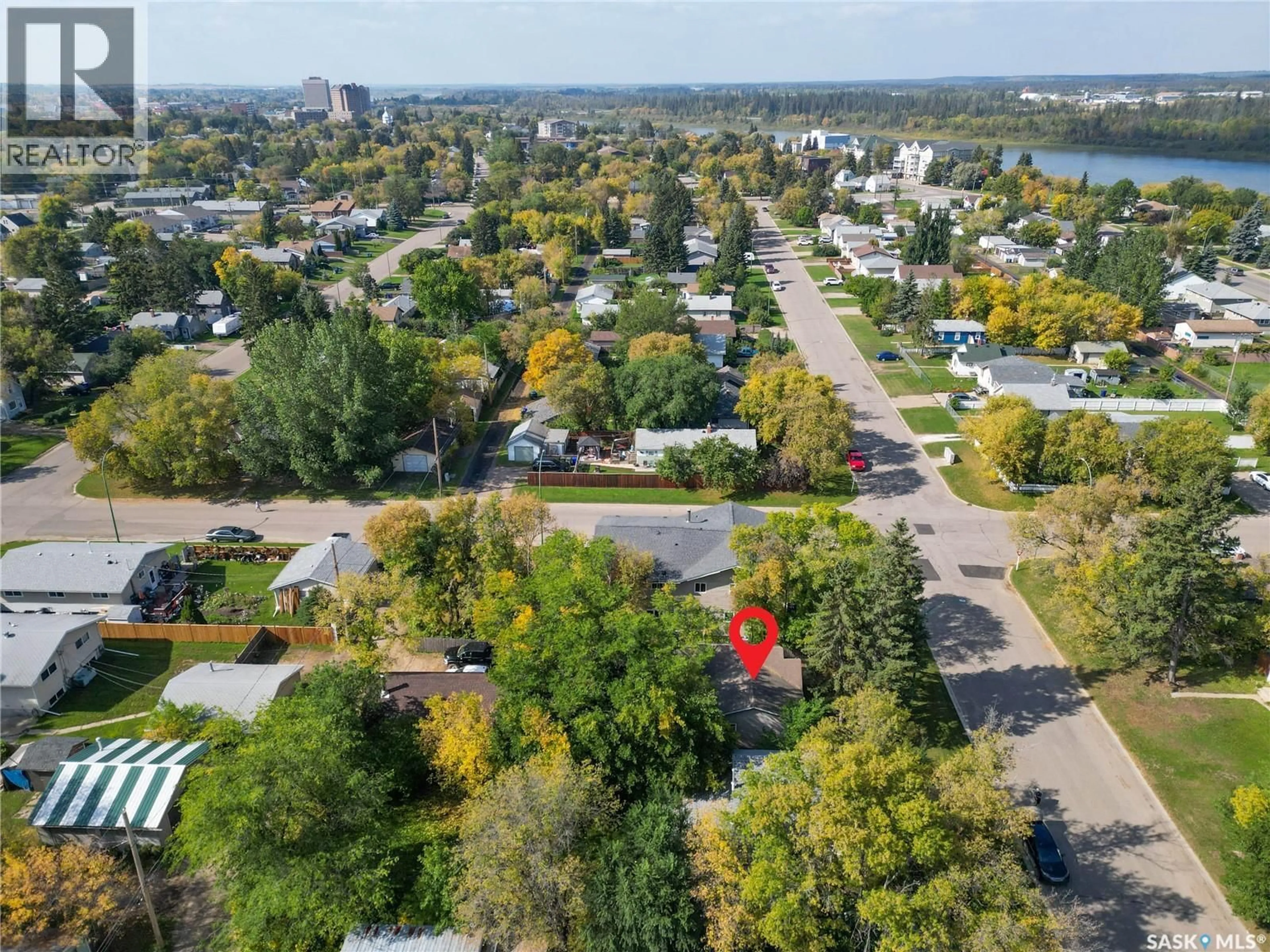 A pic from outside/outdoor area/front of a property/back of a property/a pic from drone, street for 707 5TH STREET, Prince Albert Saskatchewan S6V0M5