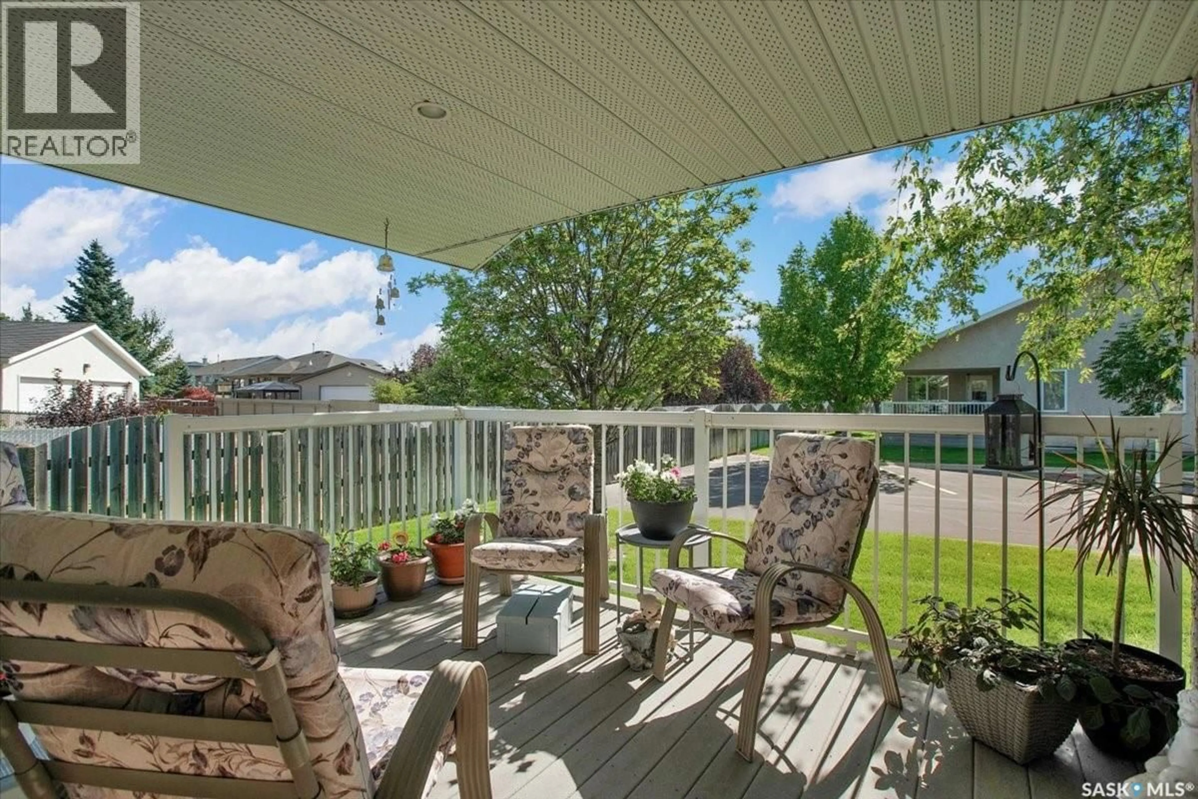 Patio, water/lake/river/ocean view for 6 CRYSTAL VILLA, Warman Saskatchewan S0K0A1