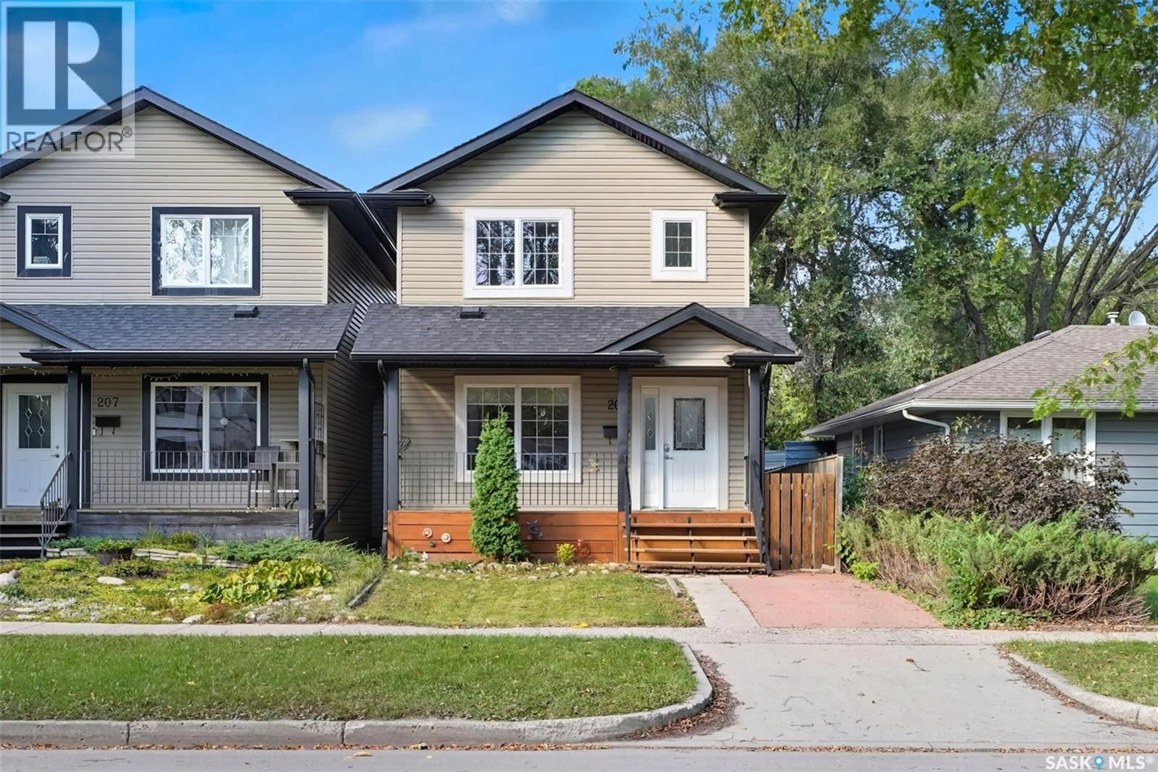 Home with brick exterior material, street for 205 TAYLOR STREET, Saskatoon Saskatchewan S7M0C4