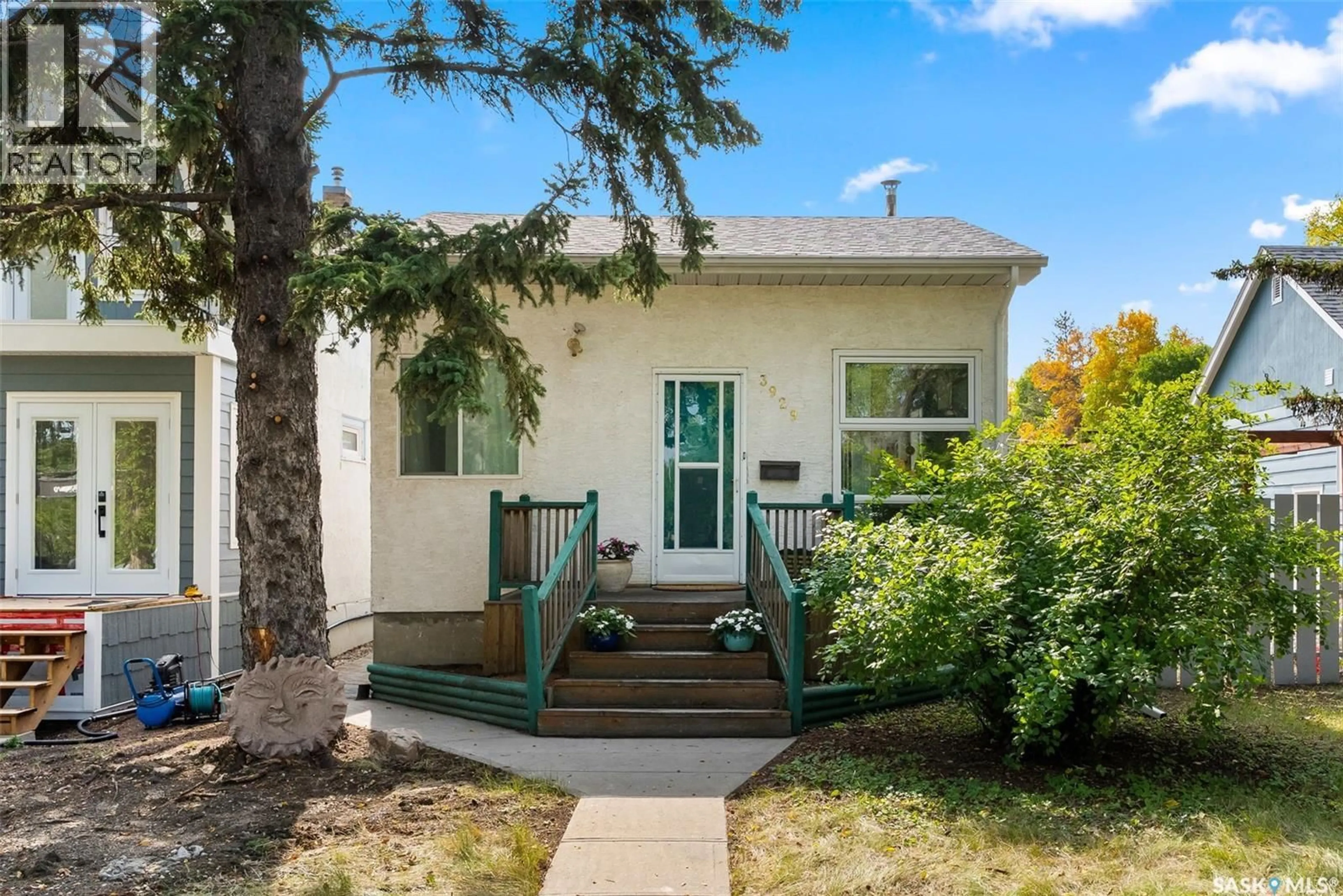 Home with vinyl exterior material, street for 3929 VICTORIA AVENUE, Regina Saskatchewan S4T1M7