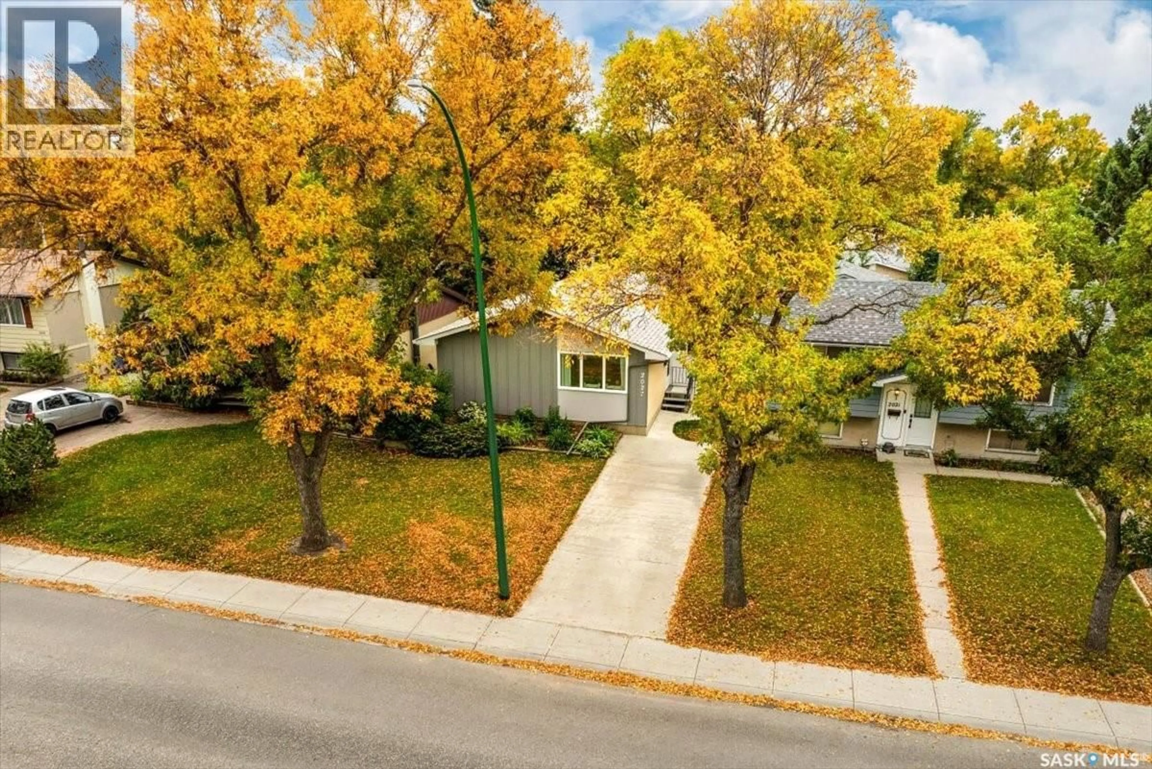A pic from outside/outdoor area/front of a property/back of a property/a pic from drone, street for 2027 DEWDNEY AVENUE, Regina Saskatchewan S4N4C3
