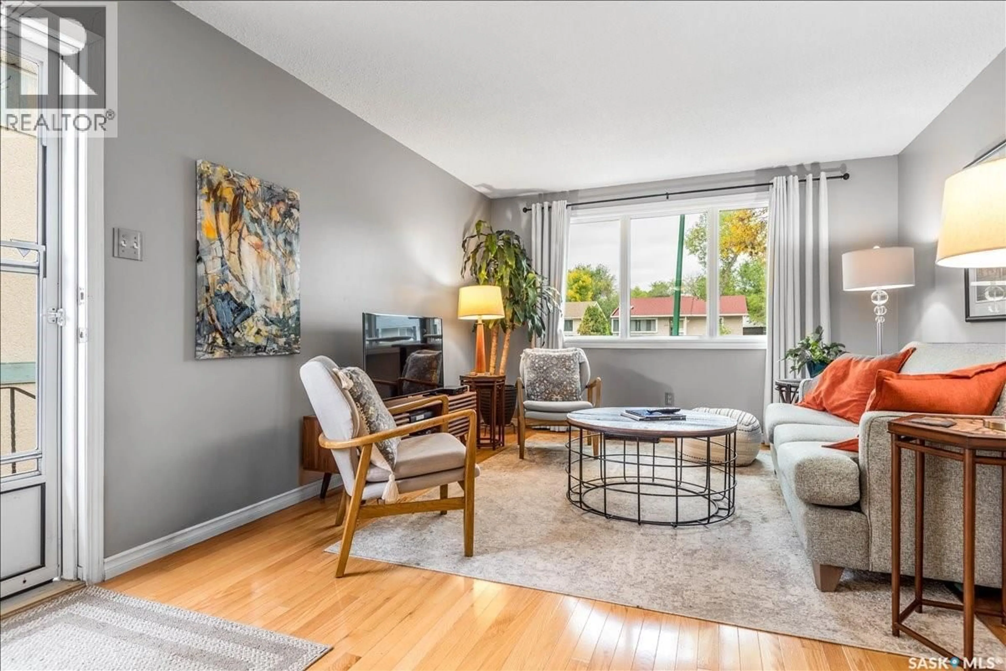 Living room with furniture, unknown for 2027 DEWDNEY AVENUE, Regina Saskatchewan S4N4C3