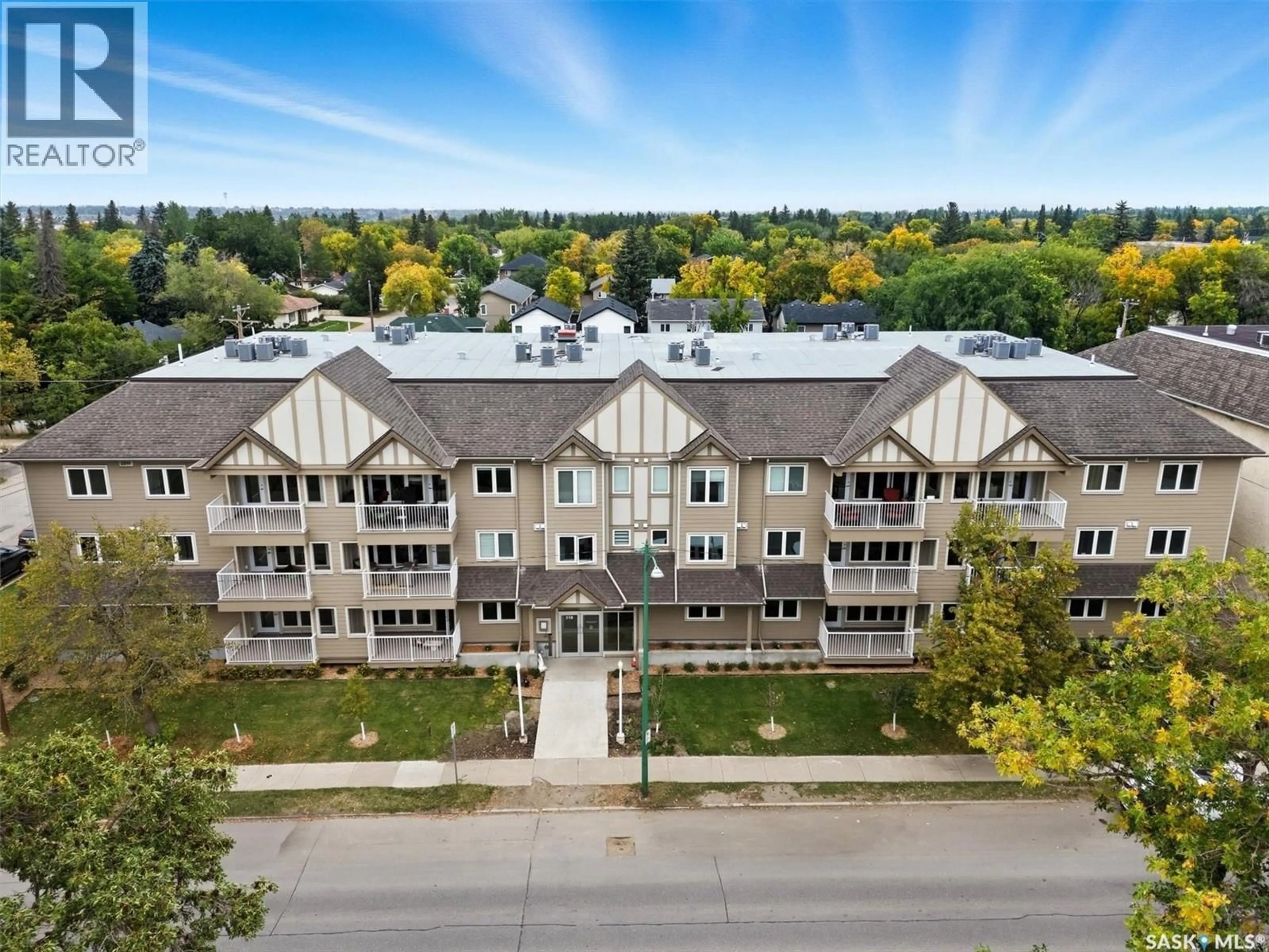 A pic from outside/outdoor area/front of a property/back of a property/a pic from drone, unknown for 208 - 318 108TH STREET, Saskatoon Saskatchewan S7N1P8