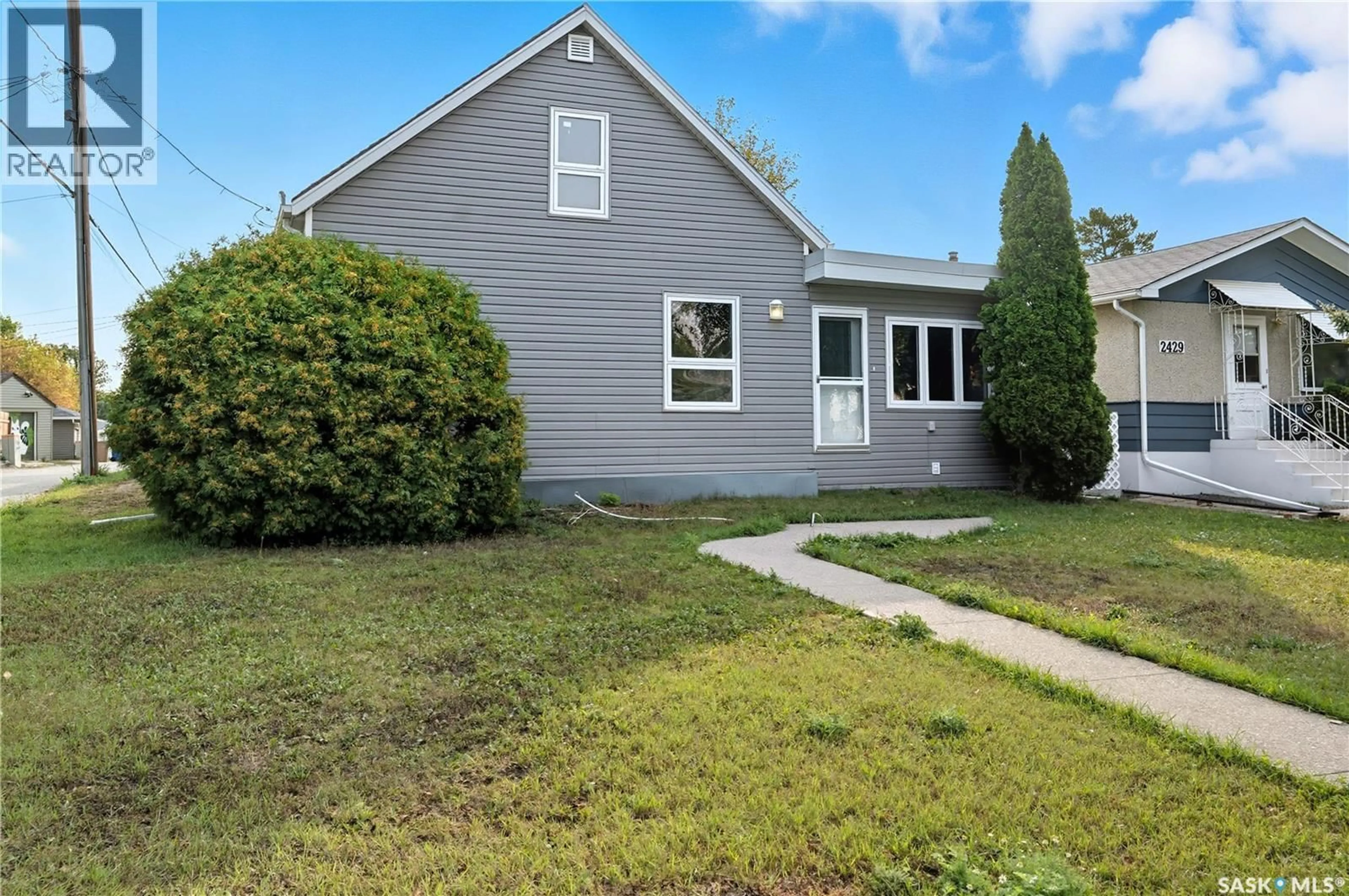 Home with vinyl exterior material, street for 2425 EDGAR STREET, Regina Saskatchewan S4N3L4