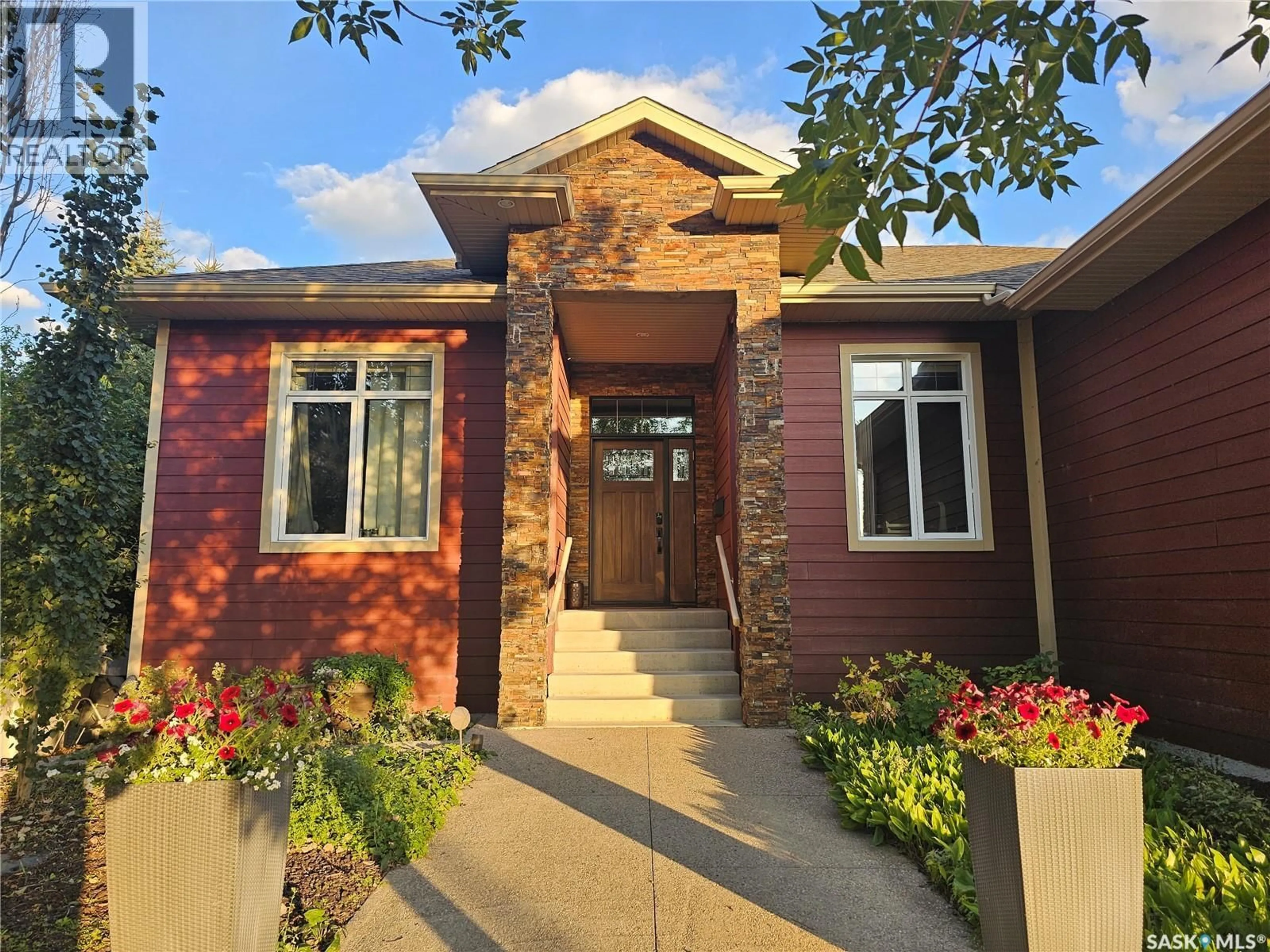Home with brick exterior material, street for 313 LAKERIDGE COURT, Warman Saskatchewan S0K0A1