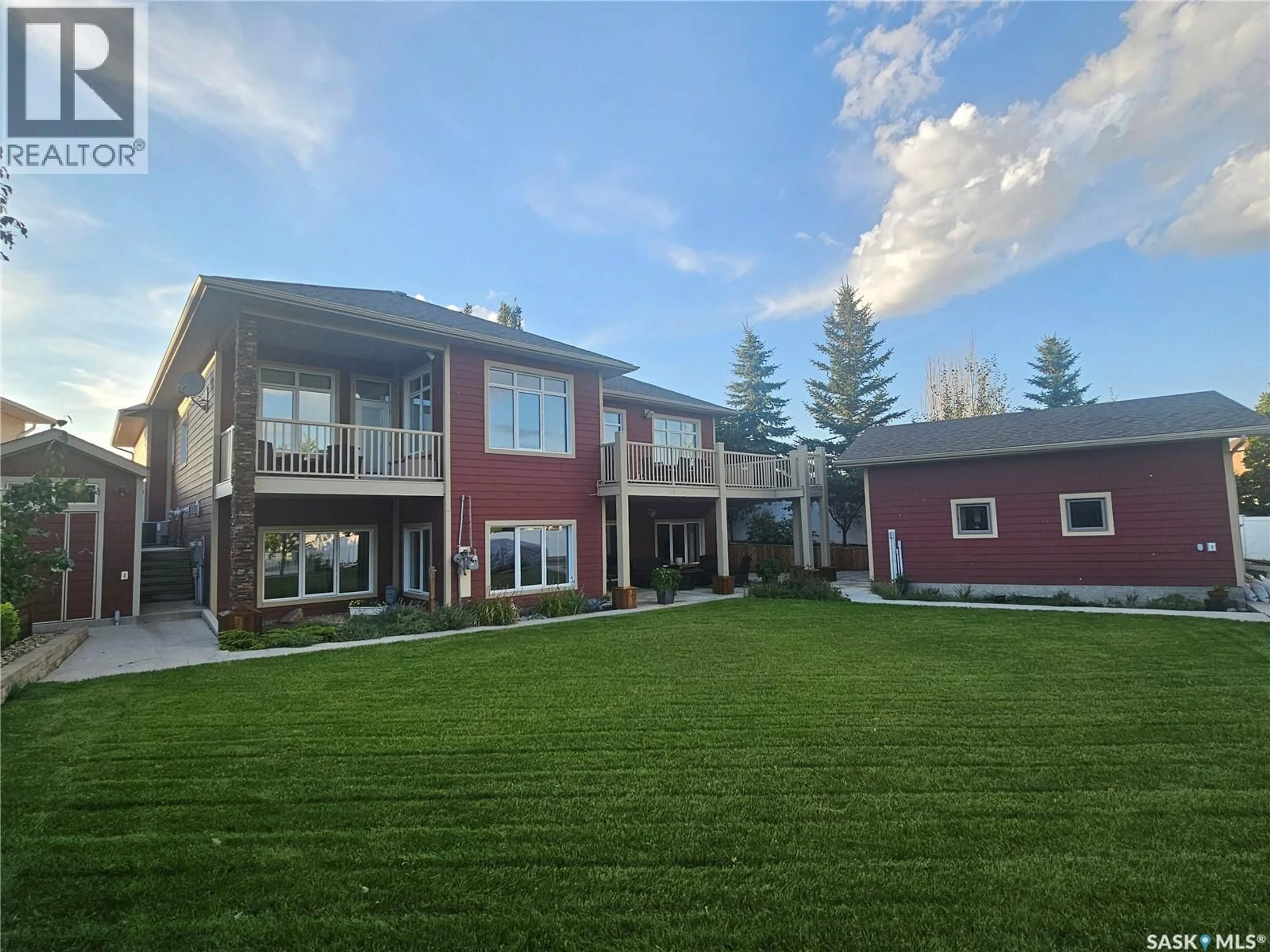 A pic from outside/outdoor area/front of a property/back of a property/a pic from drone, mountain view for 313 LAKERIDGE COURT, Warman Saskatchewan S0K0A1