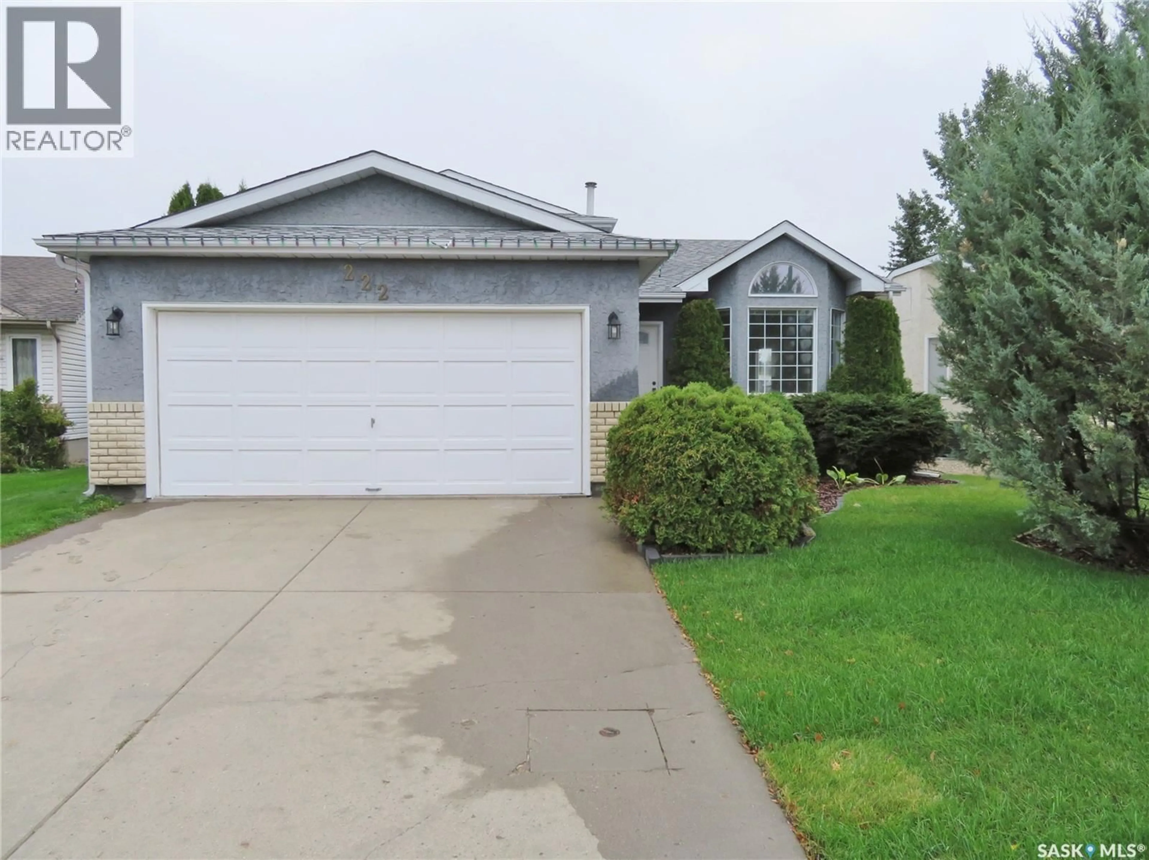 Home with vinyl exterior material, street for 222 KELLER CRESCENT, Saskatoon Saskatchewan S7J5G3