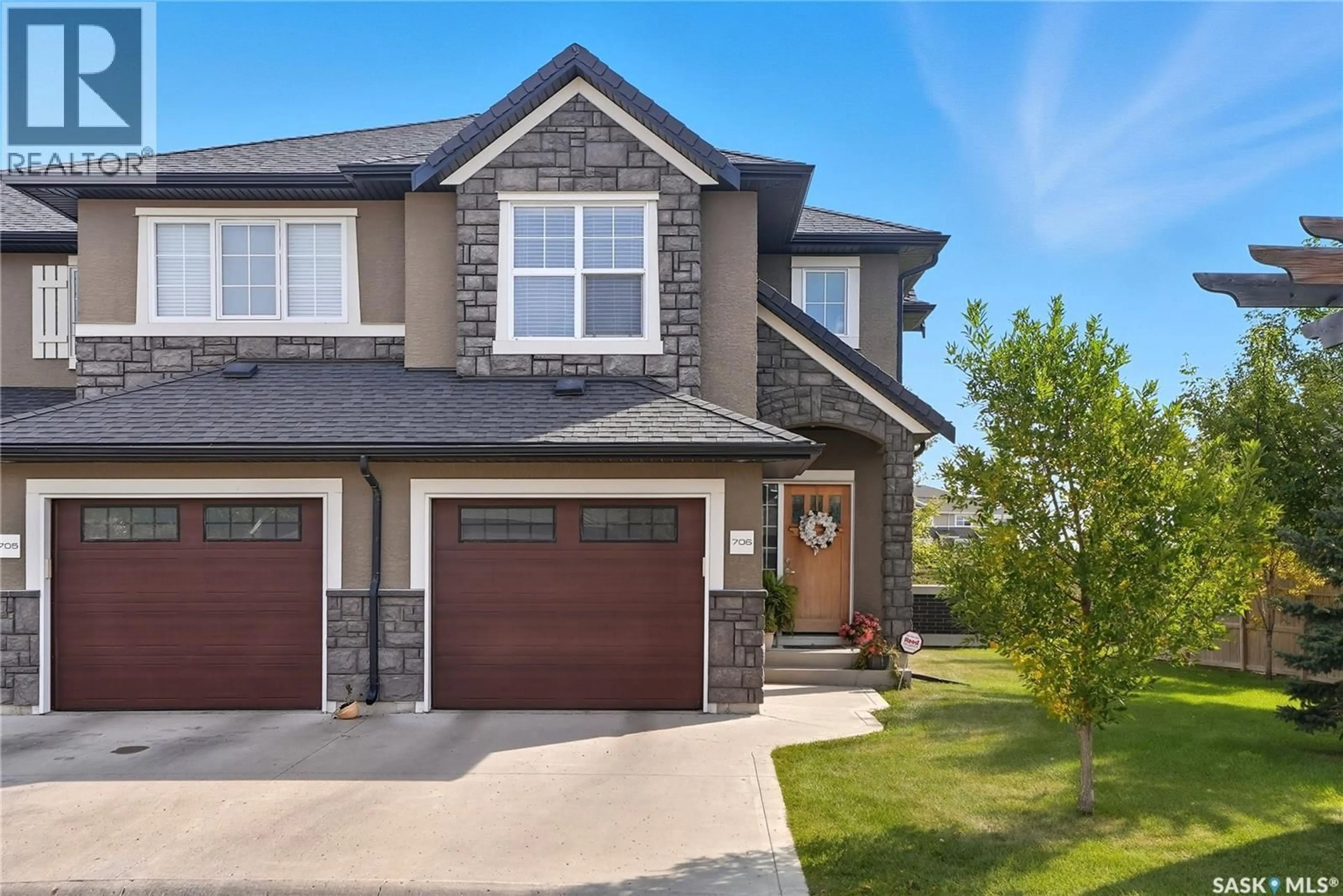 Home with brick exterior material, street for 2012 - 706 POHORECKY CRESCENT, Saskatoon Saskatchewan S7W0V4