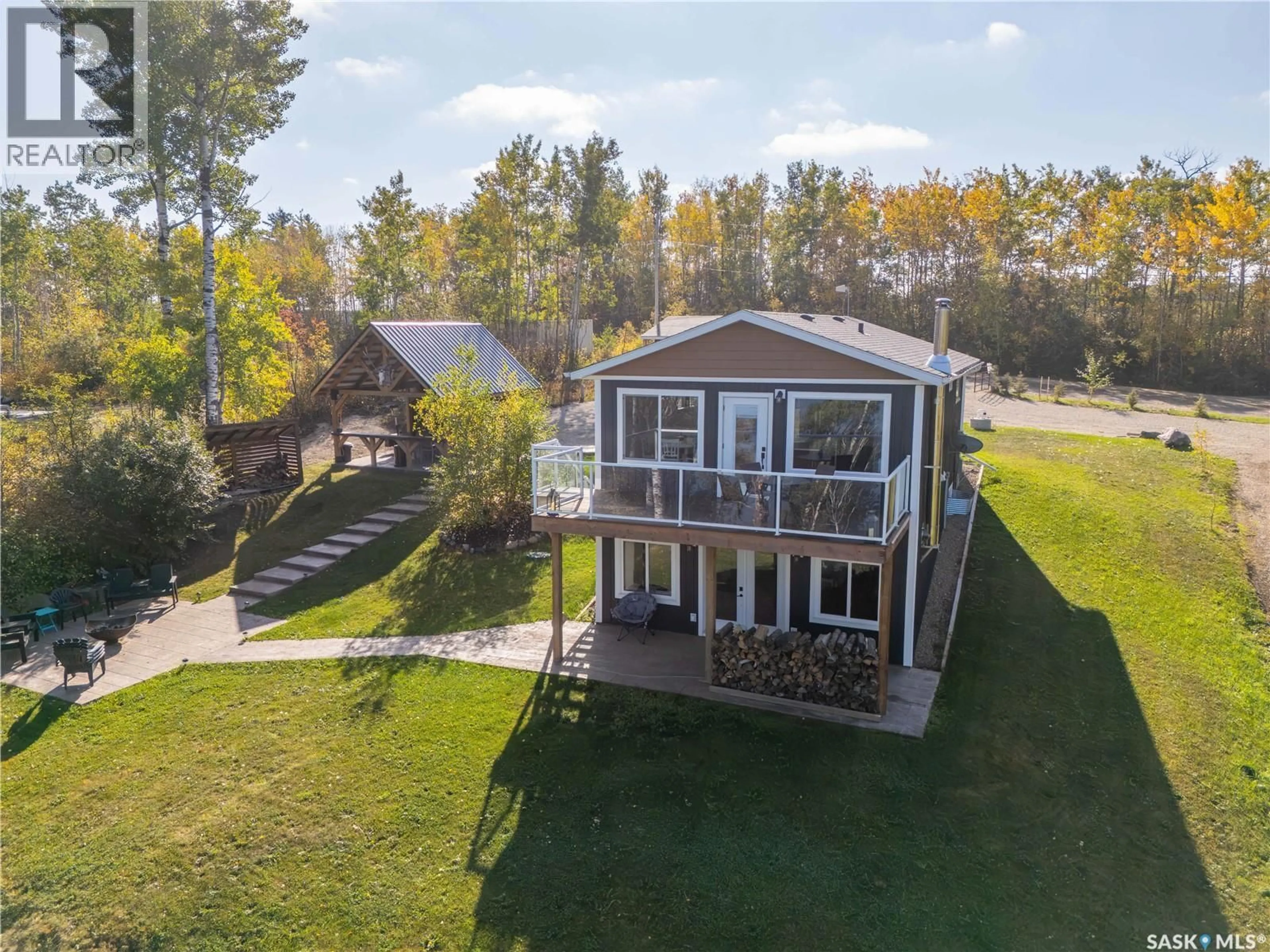 A pic from outside/outdoor area/front of a property/back of a property/a pic from drone, water/lake/river/ocean view for 24 LAKESHORE DRIVE, Loon Lake Rm No. 561 Saskatchewan S0M1L0