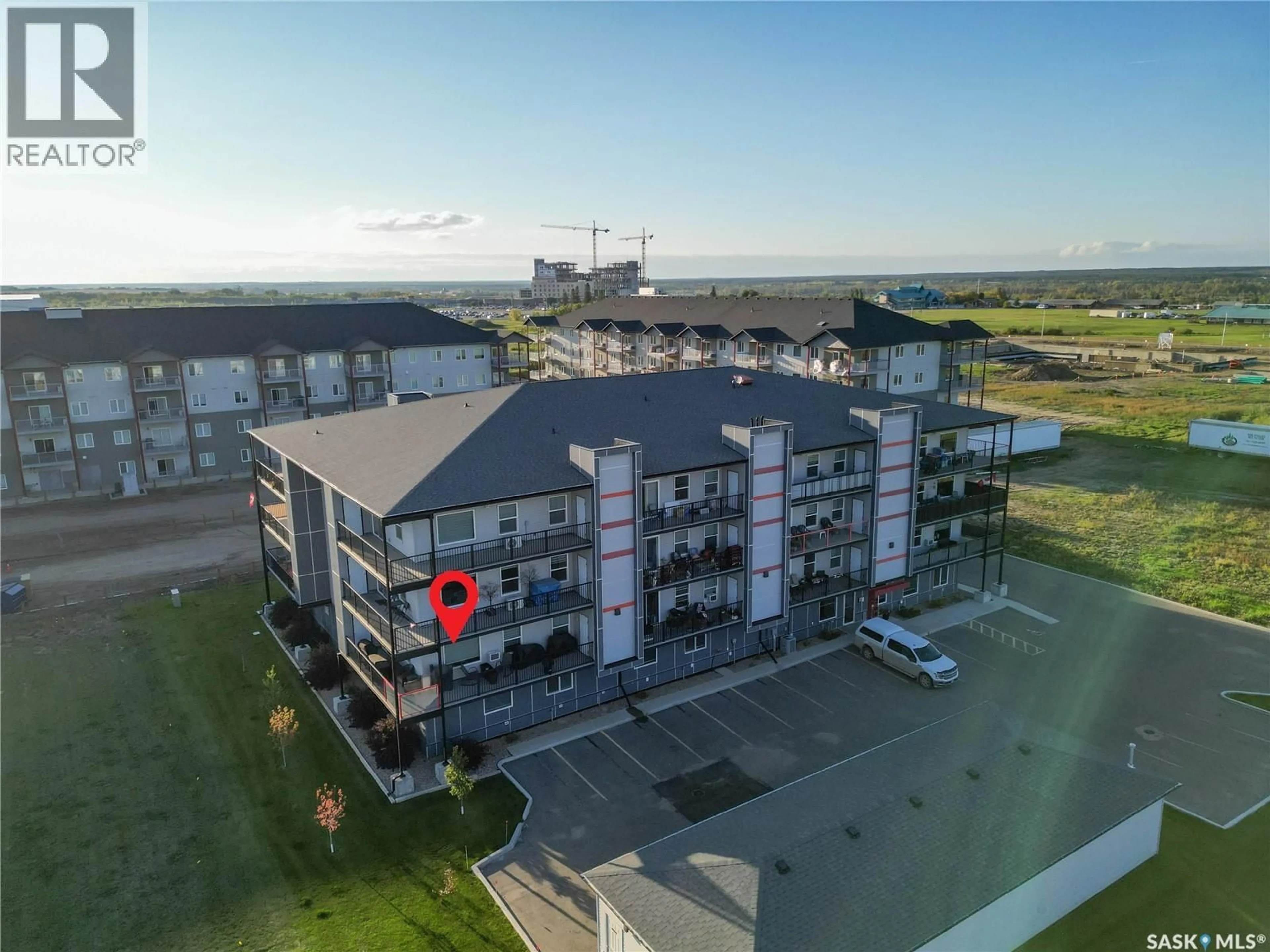 A pic from outside/outdoor area/front of a property/back of a property/a pic from drone, building for 303 - 2641 WOODBRIDGE DRIVE, Prince Albert Saskatchewan S6V0A9