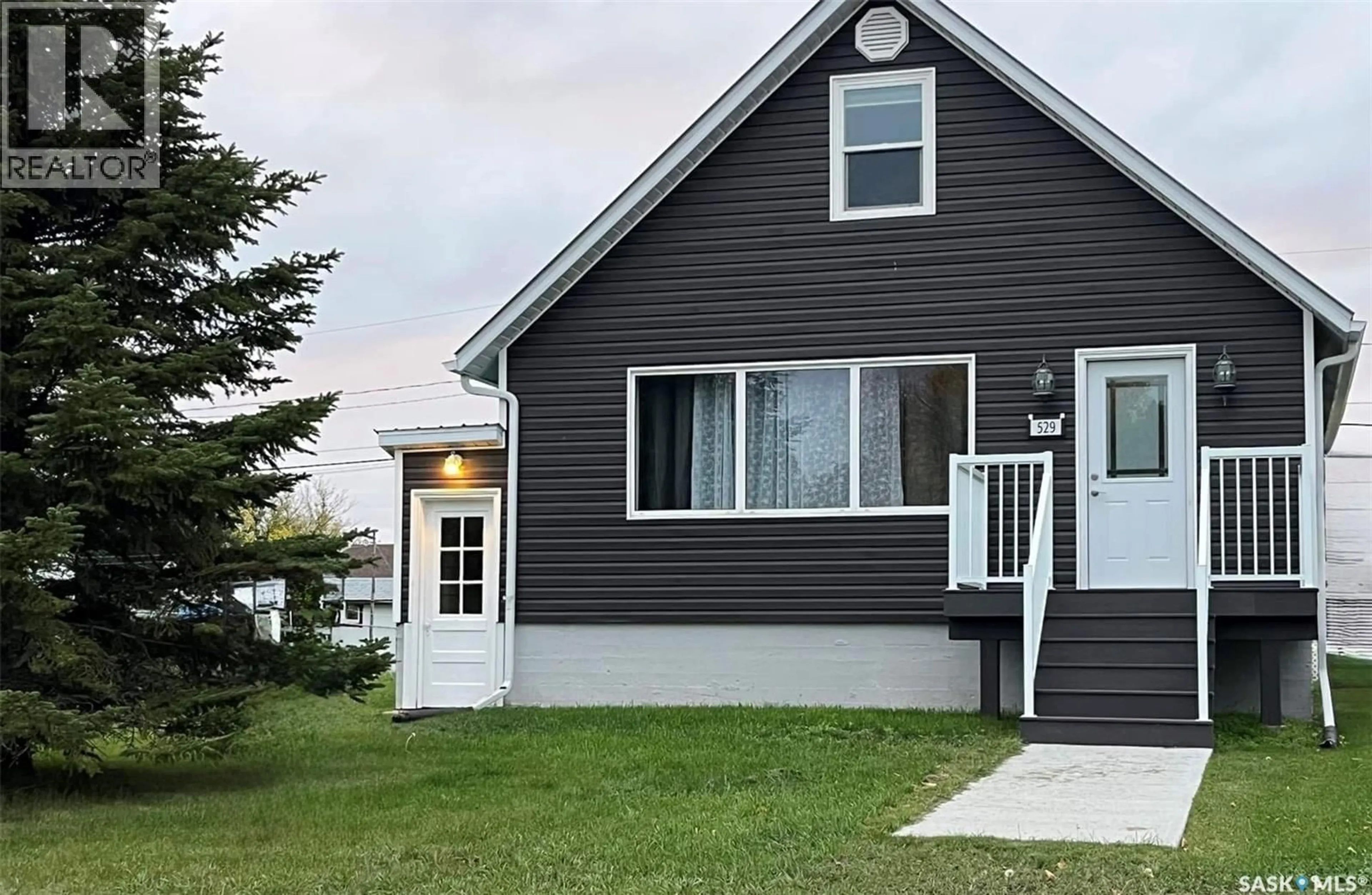 Home with vinyl exterior material, street for 529 ALBERT STREET, Hudson Bay Saskatchewan S0E0Y0