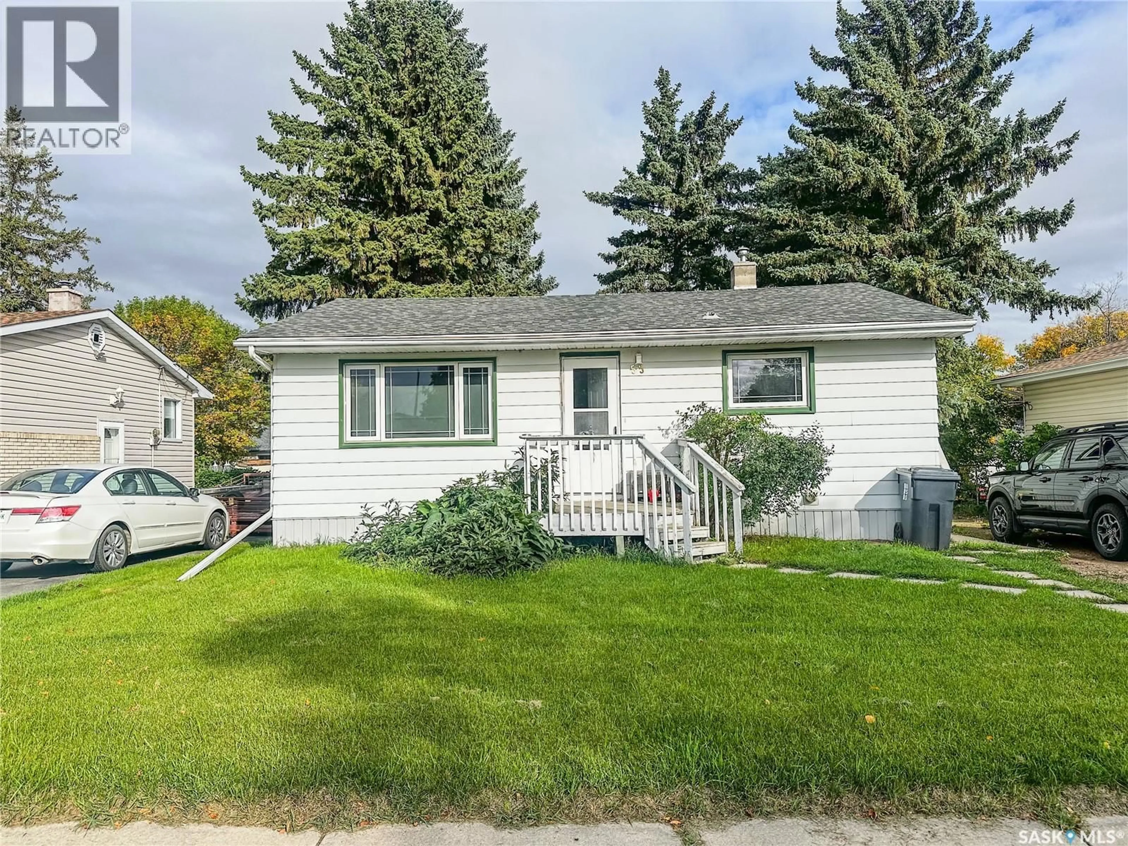 Home with vinyl exterior material, street for 55 REAMAN AVENUE, Yorkton Saskatchewan S3N2B8