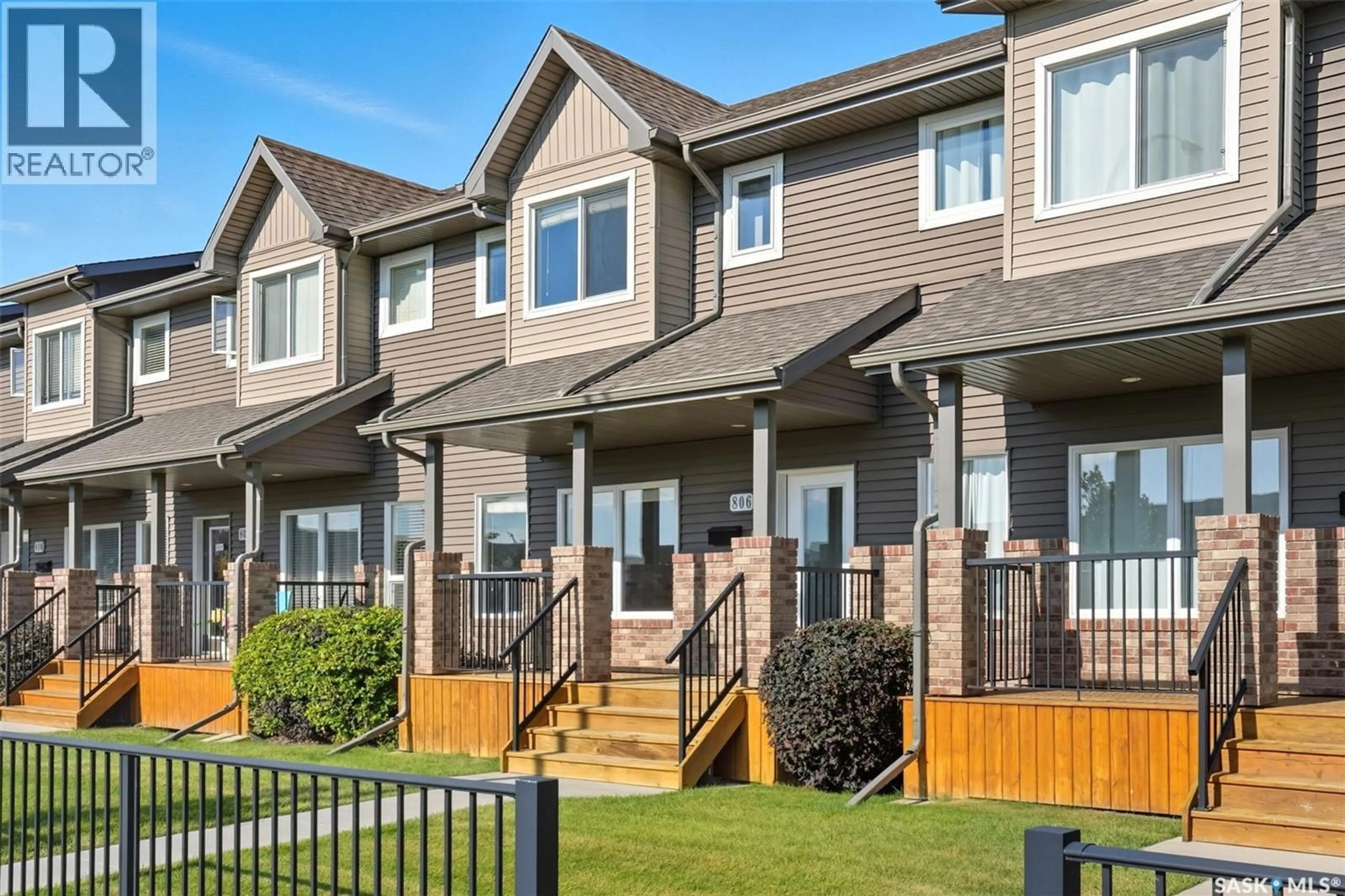 Home with vinyl exterior material, street for 806 STENSRUD ROAD, Saskatoon Saskatchewan S7W0C9
