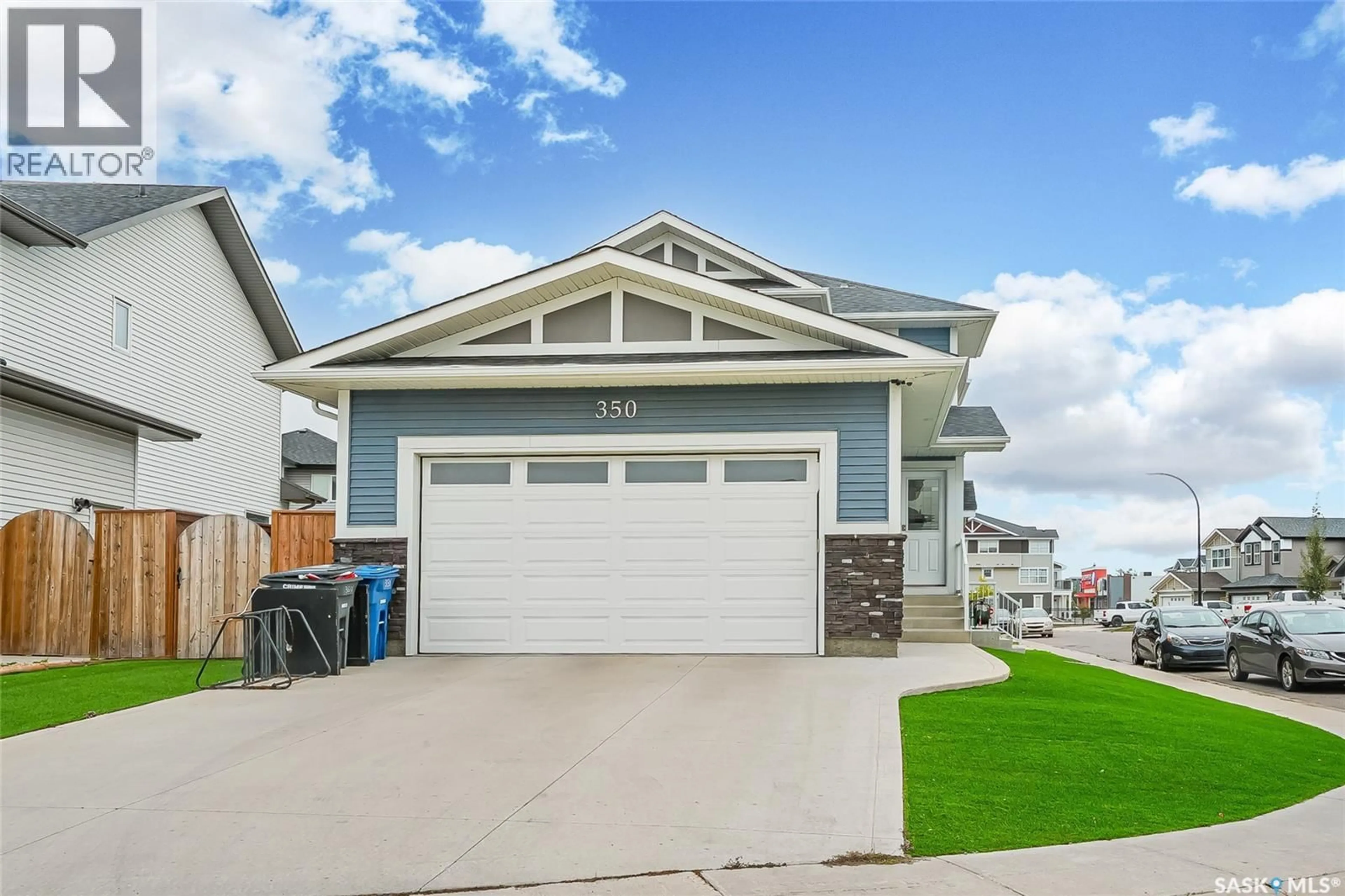 Home with vinyl exterior material, street for 350 HASSARD CLOSE, Saskatoon Saskatchewan S7L4Y7