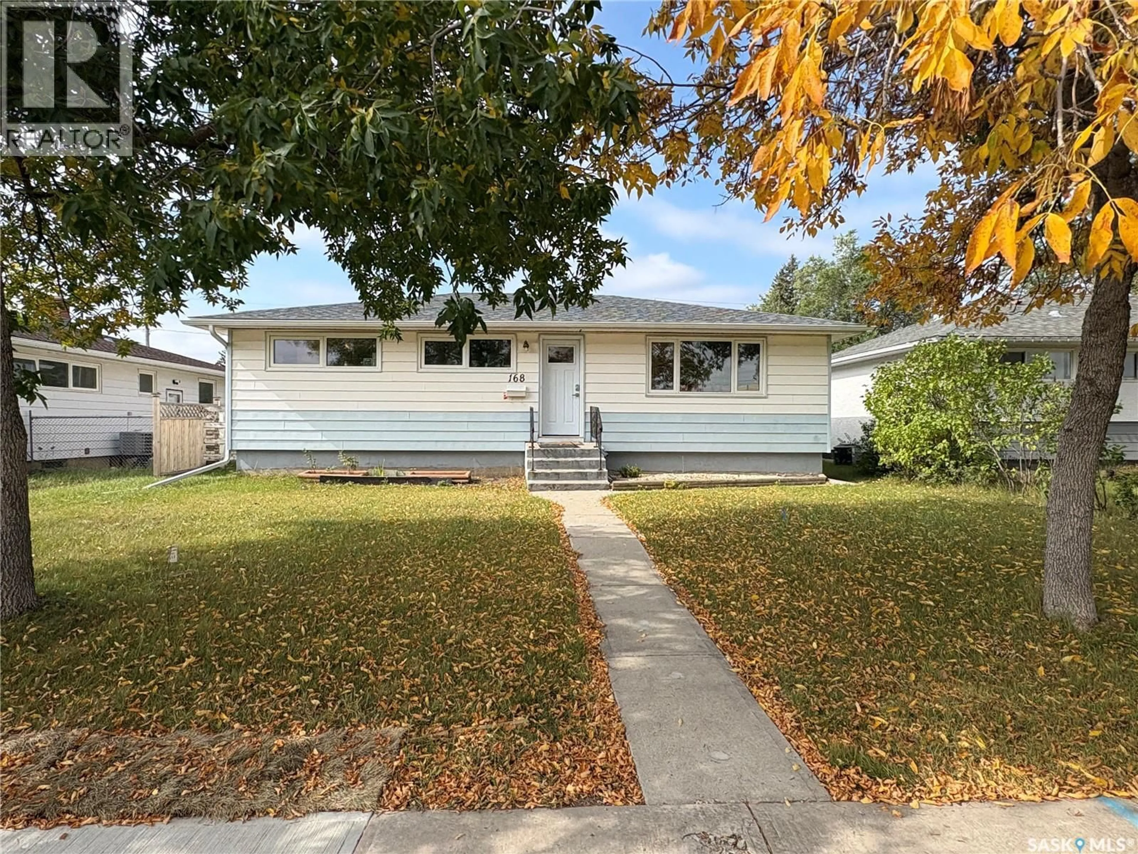 Home with vinyl exterior material, street for 168 TORONTO STREET, Regina Saskatchewan S4R1L7