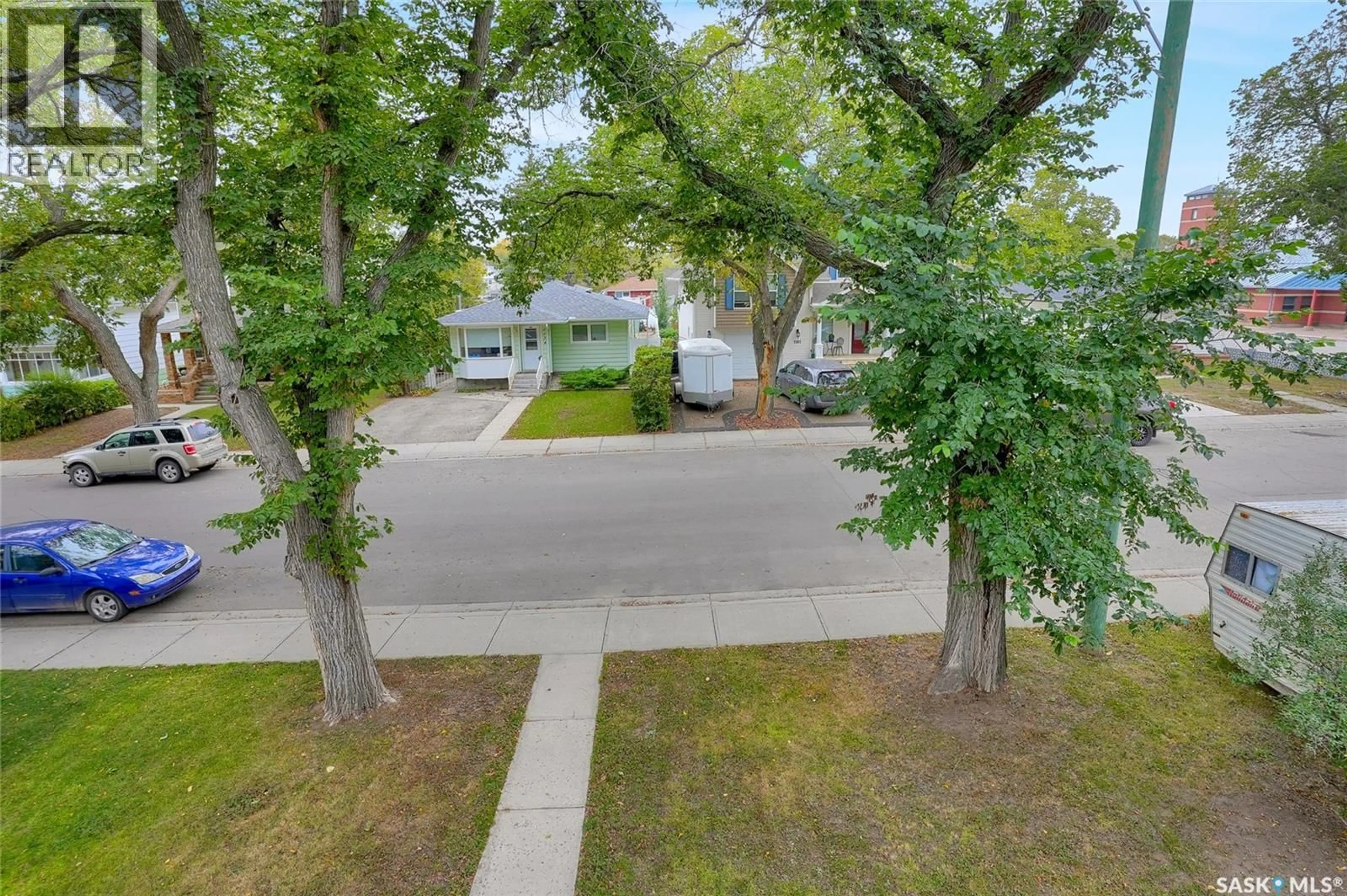 A pic from outside/outdoor area/front of a property/back of a property/a pic from drone, street for 1175 ALDER AVENUE, Moose Jaw Saskatchewan S6H0Y6