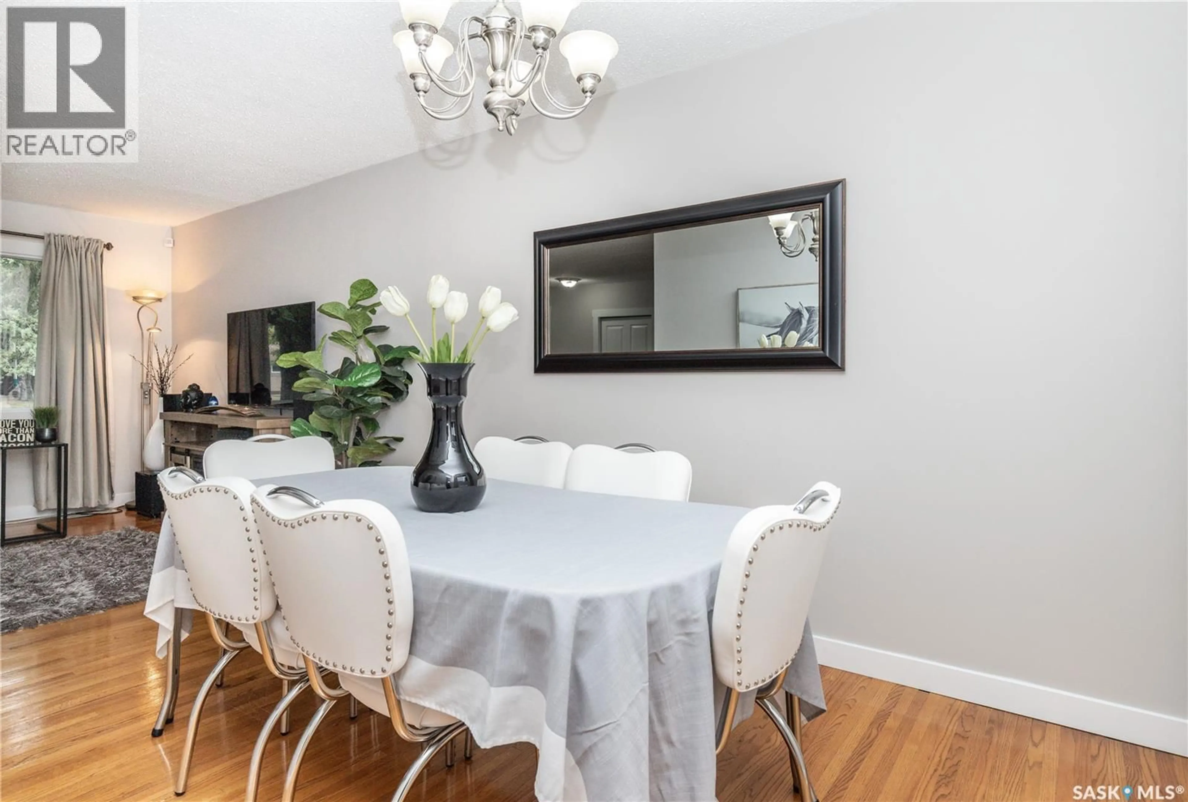 Dining room, wood/laminate floor for 110 WILSON CRESCENT, Saskatoon Saskatchewan S7J2L5