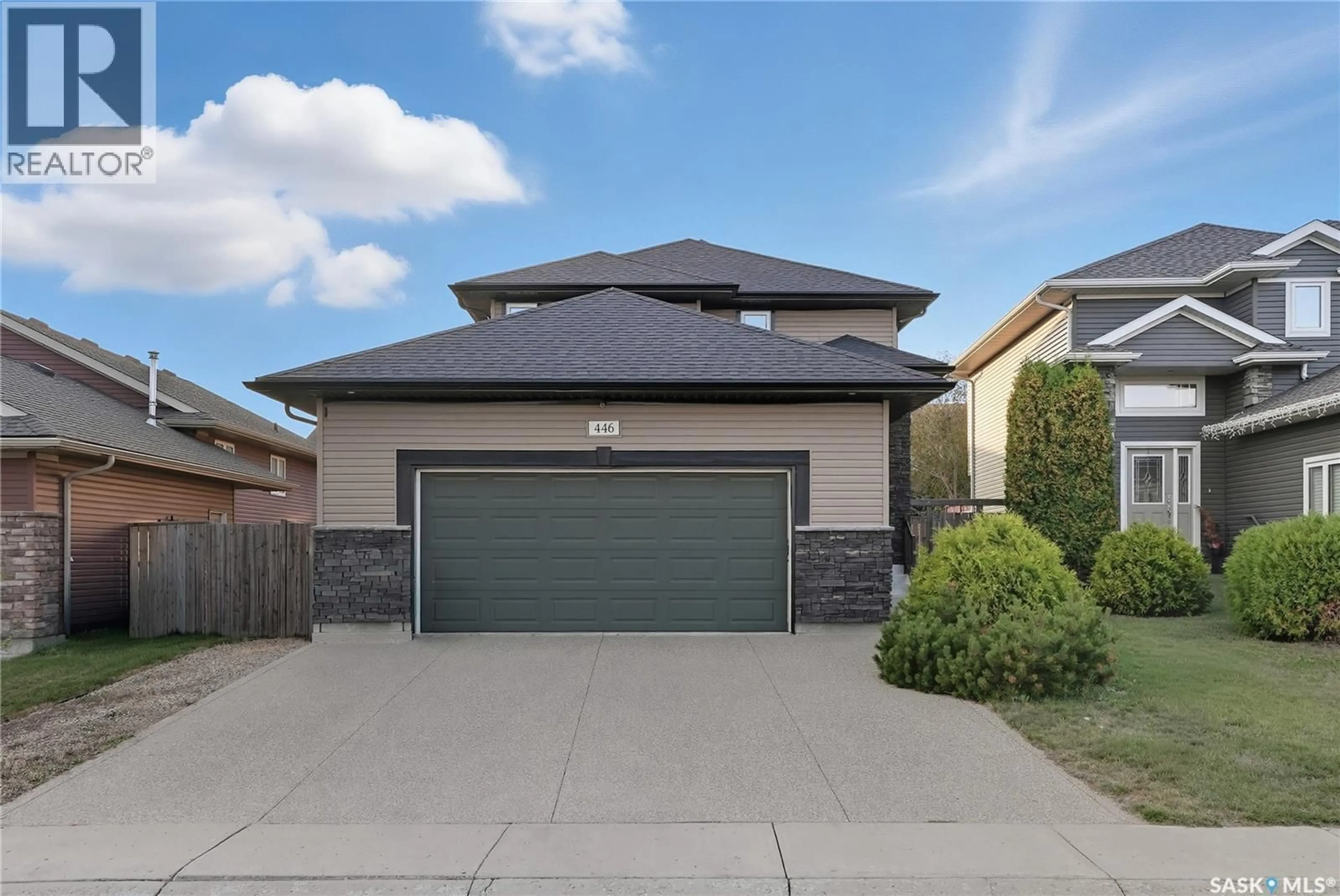 Home with brick exterior material, street for 446 LEWIN WAY, Saskatoon Saskatchewan S7T0T3