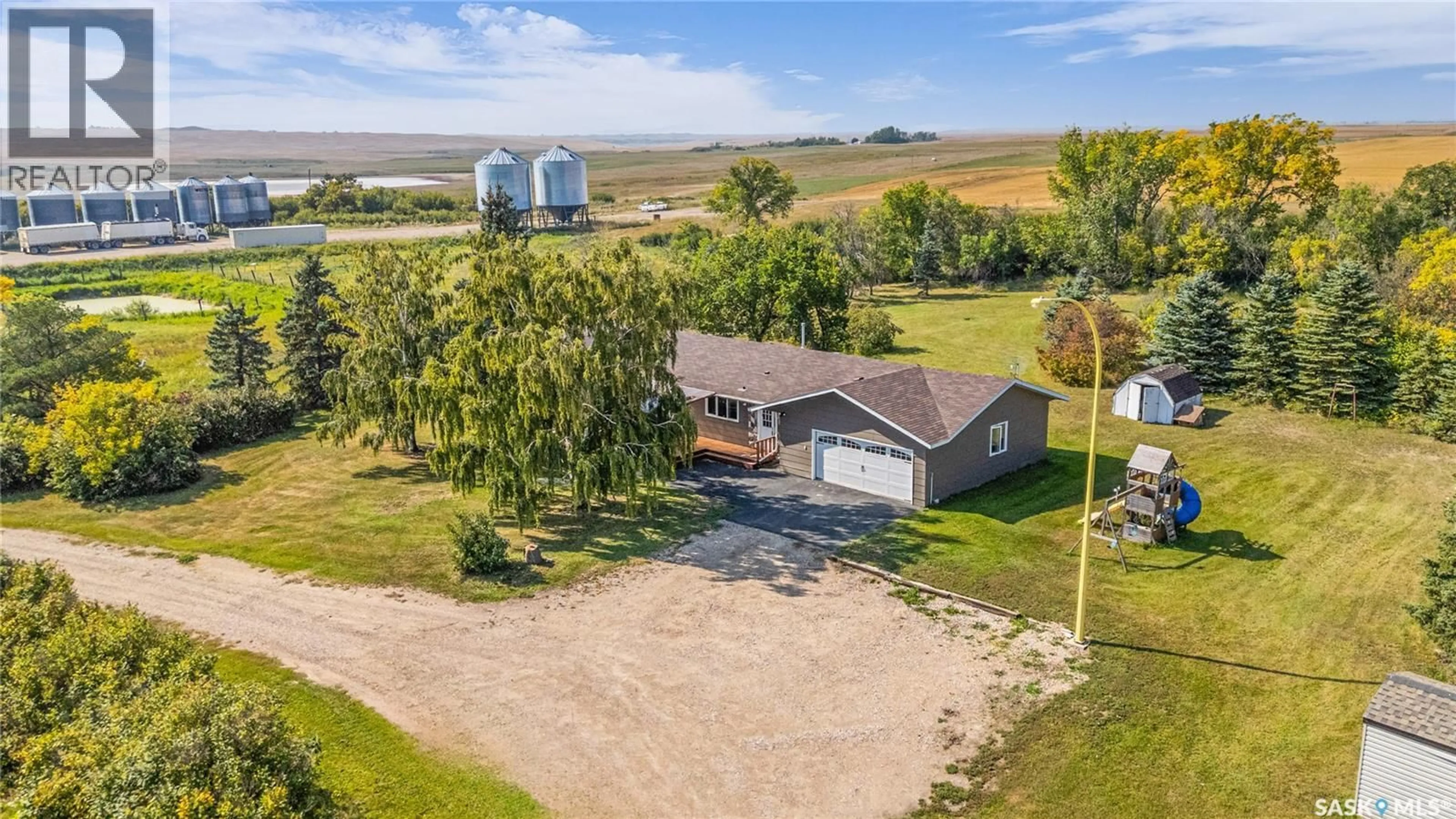 A pic from outside/outdoor area/front of a property/back of a property/a pic from drone, water/lake/river/ocean view for ALLAN SE ACREAGE, Young Saskatchewan S0K4Y0