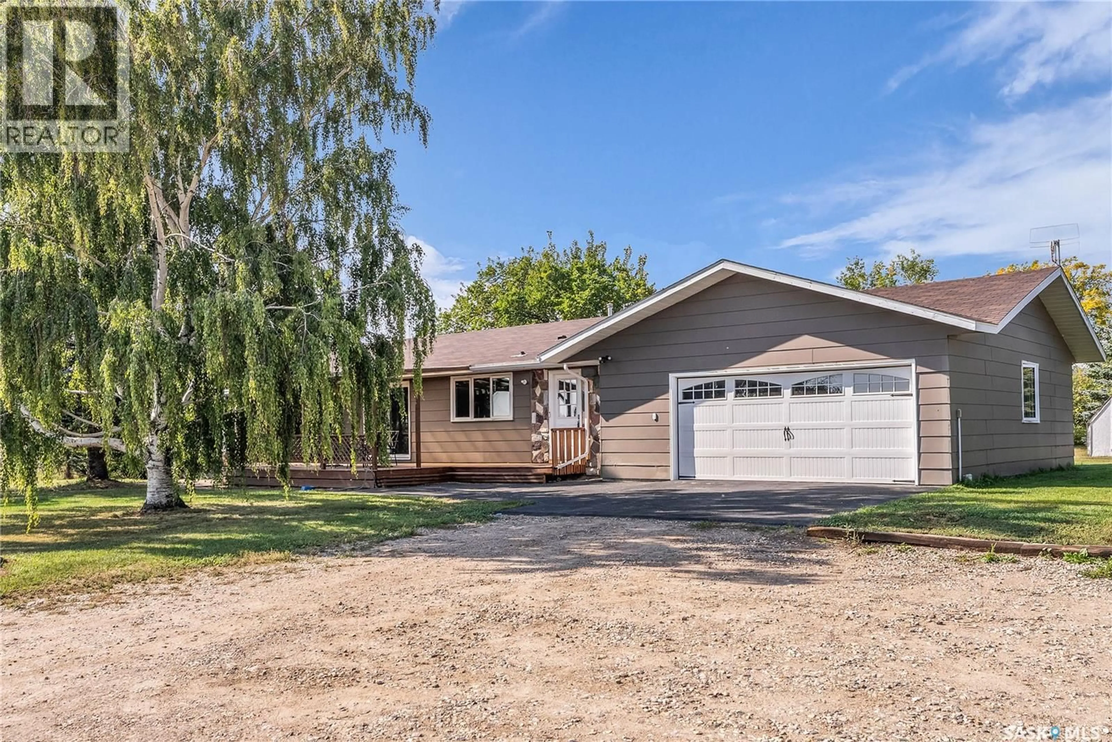 Home with vinyl exterior material, street for ALLAN SE ACREAGE, Young Saskatchewan S0K4Y0