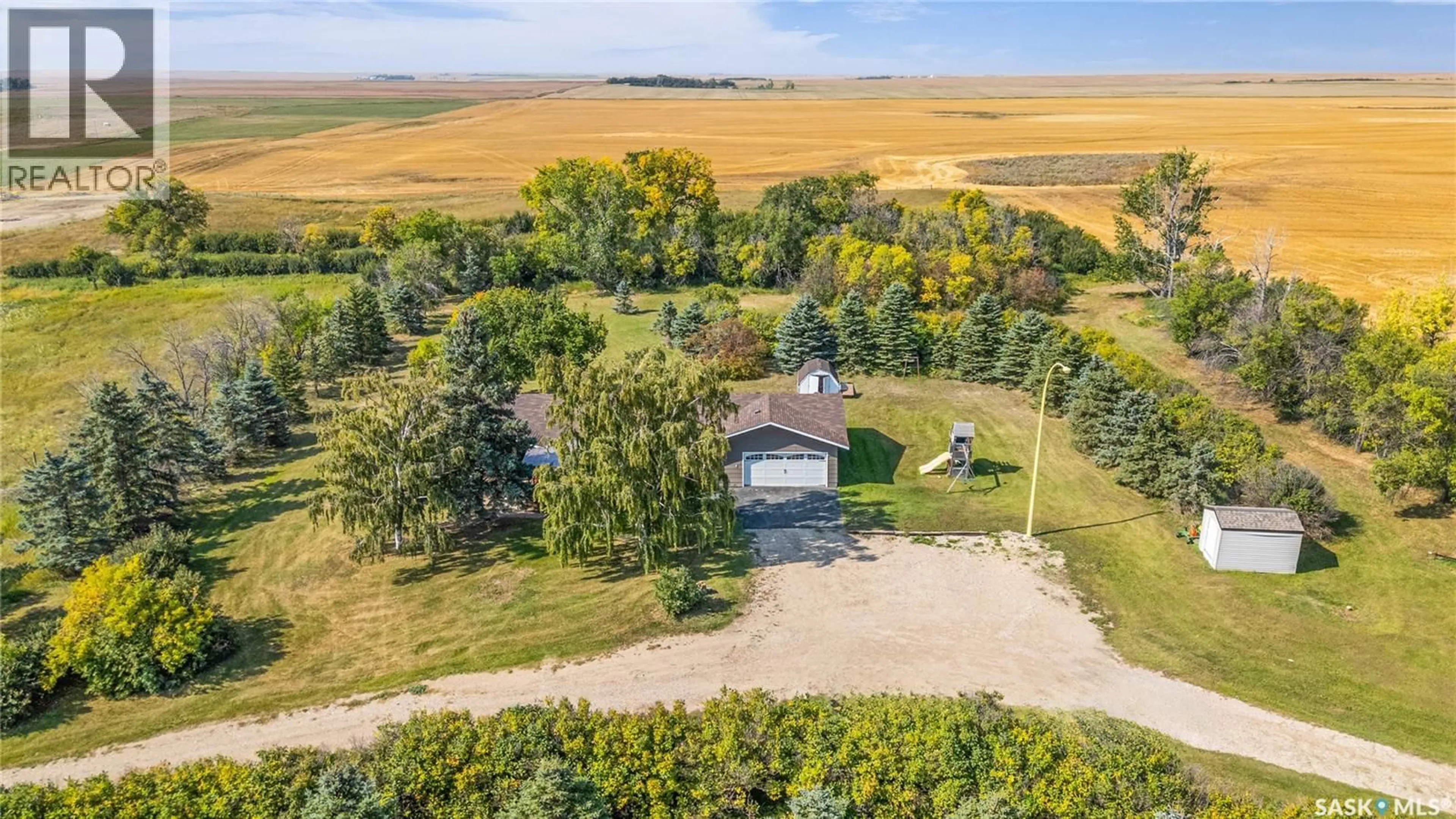 A pic from outside/outdoor area/front of a property/back of a property/a pic from drone, water/lake/river/ocean view for ALLAN SE ACREAGE, Young Saskatchewan S0K4Y0