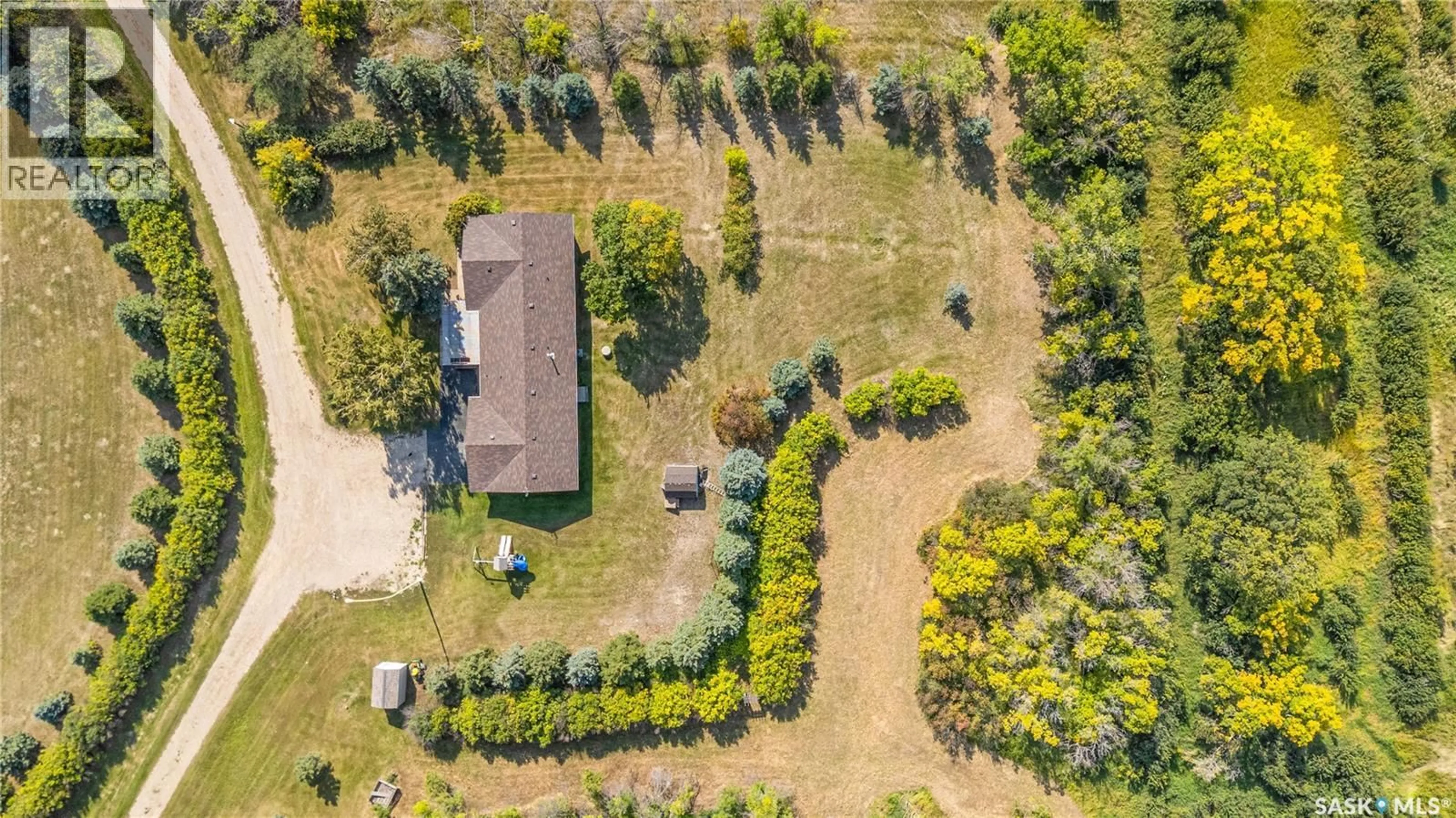 A pic from outside/outdoor area/front of a property/back of a property/a pic from drone, forest/trees view for ALLAN SE ACREAGE, Young Saskatchewan S0K4Y0