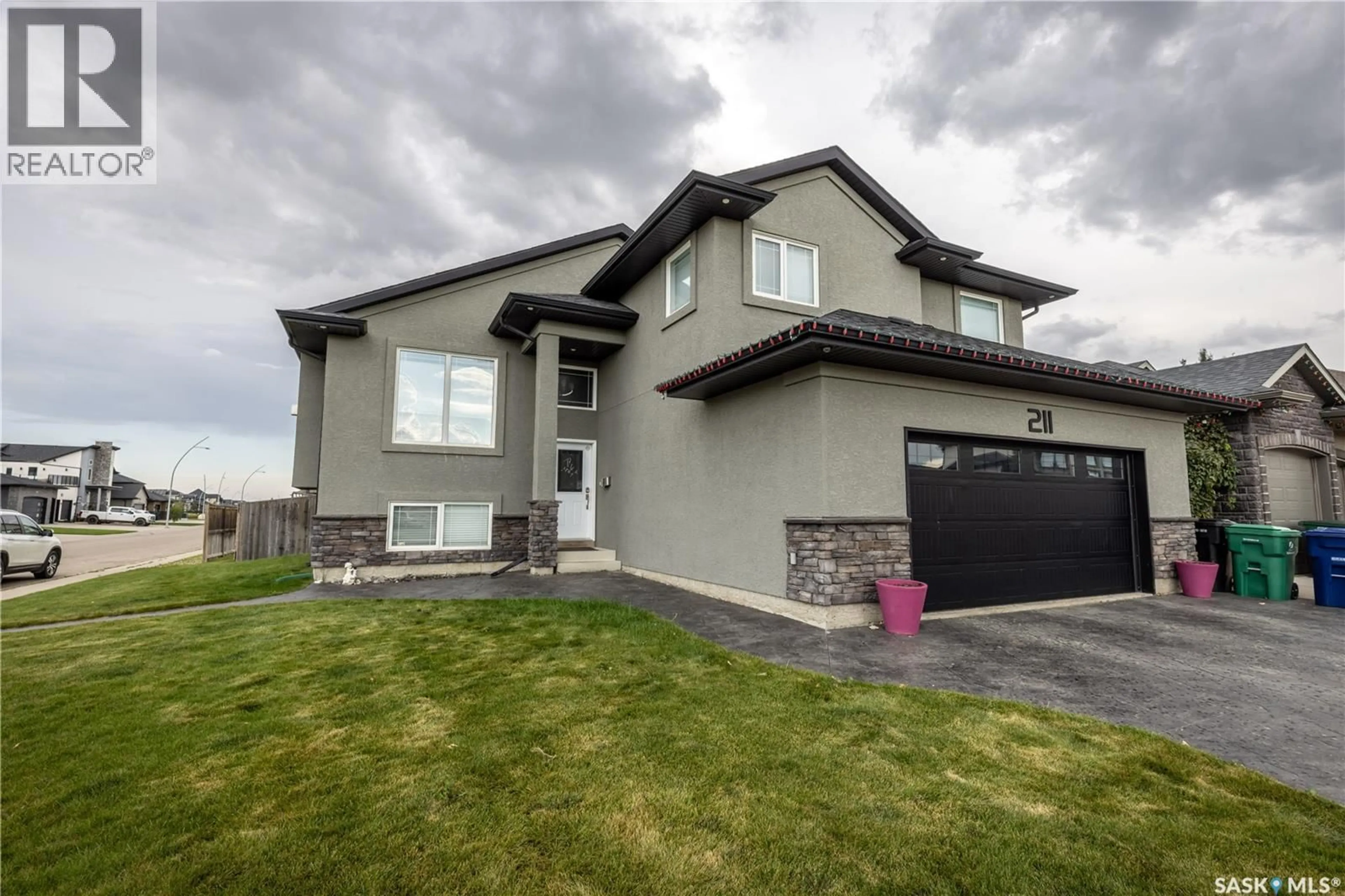 Home with brick exterior material, street for 211 SAUER CRESCENT, Saskatoon Saskatchewan S7S1L9