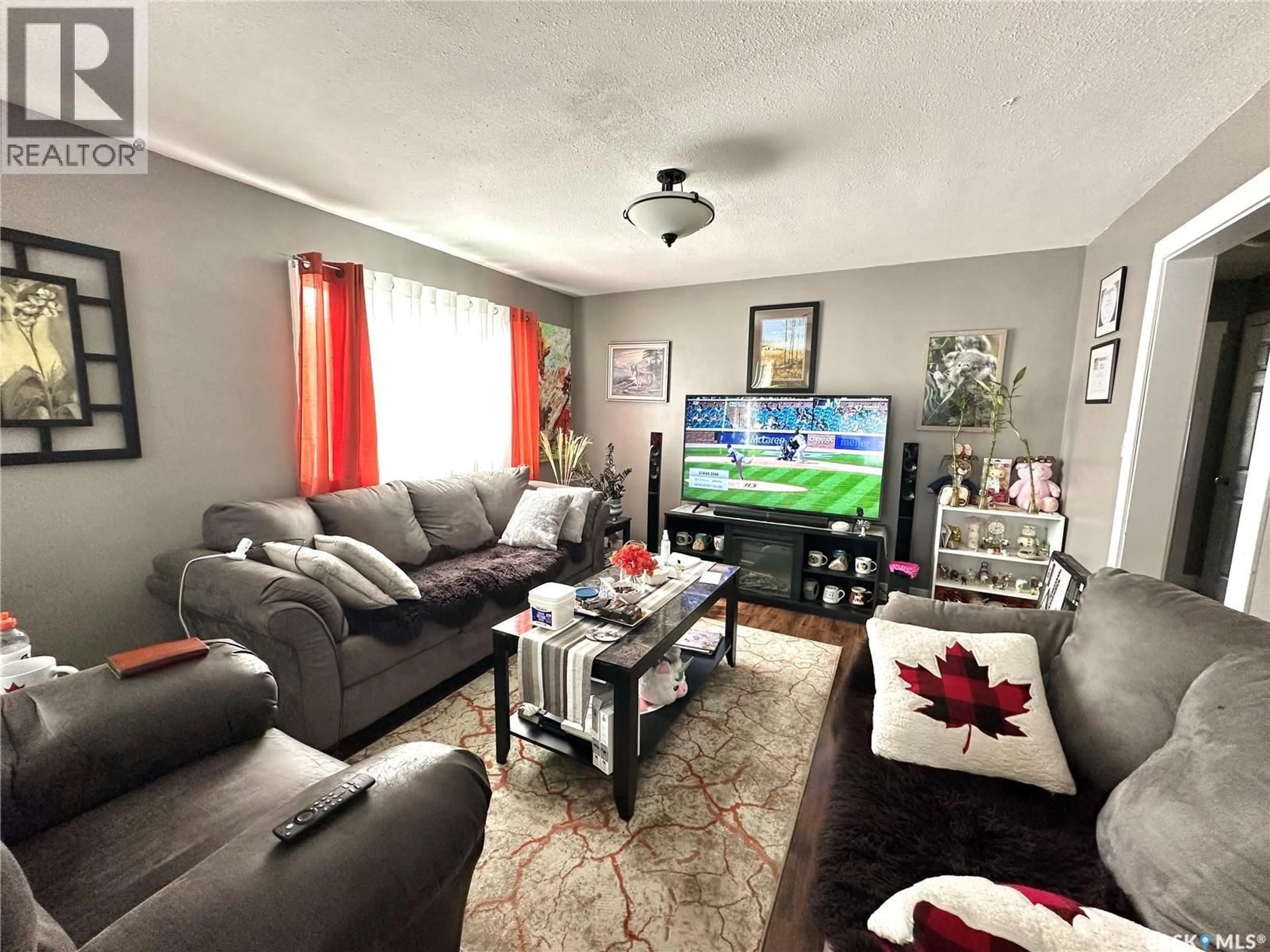 Living room with furniture, unknown for 1502 99TH STREET, North Battleford Saskatchewan S9A3Y5
