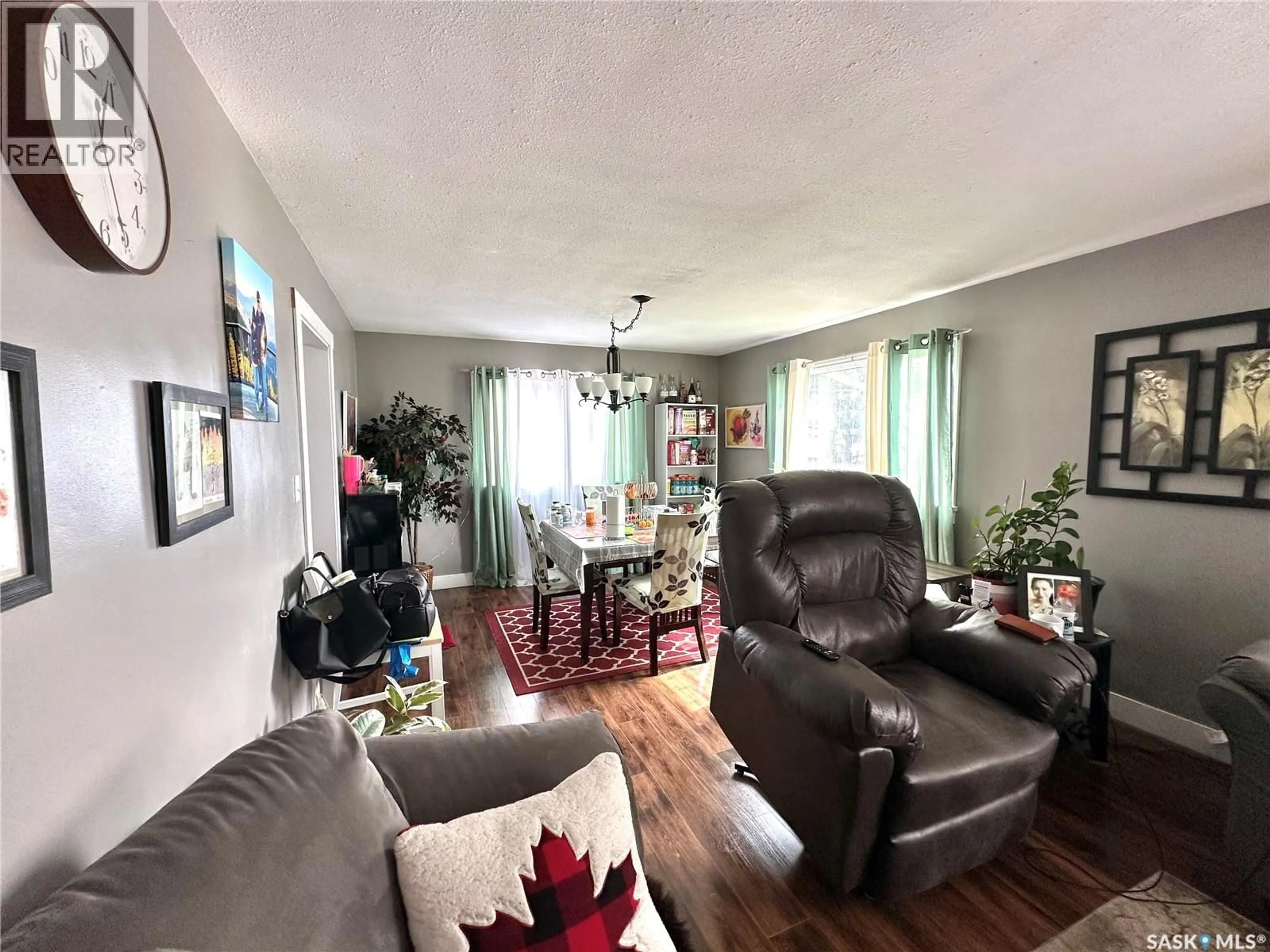 Living room with furniture, unknown for 1502 99TH STREET, North Battleford Saskatchewan S9A3Y5