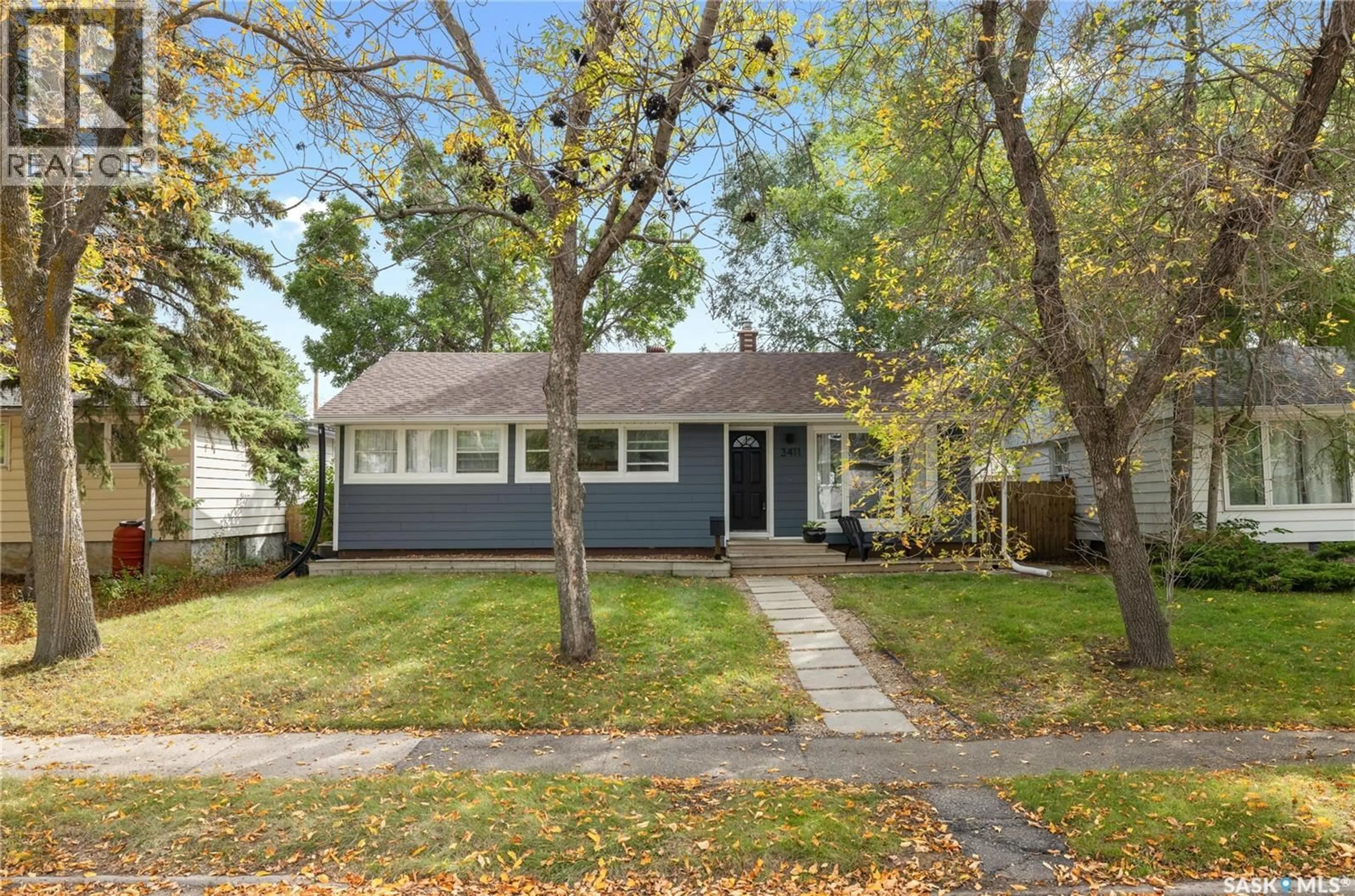 Home with vinyl exterior material, street for 3411 21ST AVENUE, Regina Saskatchewan S4S0T8