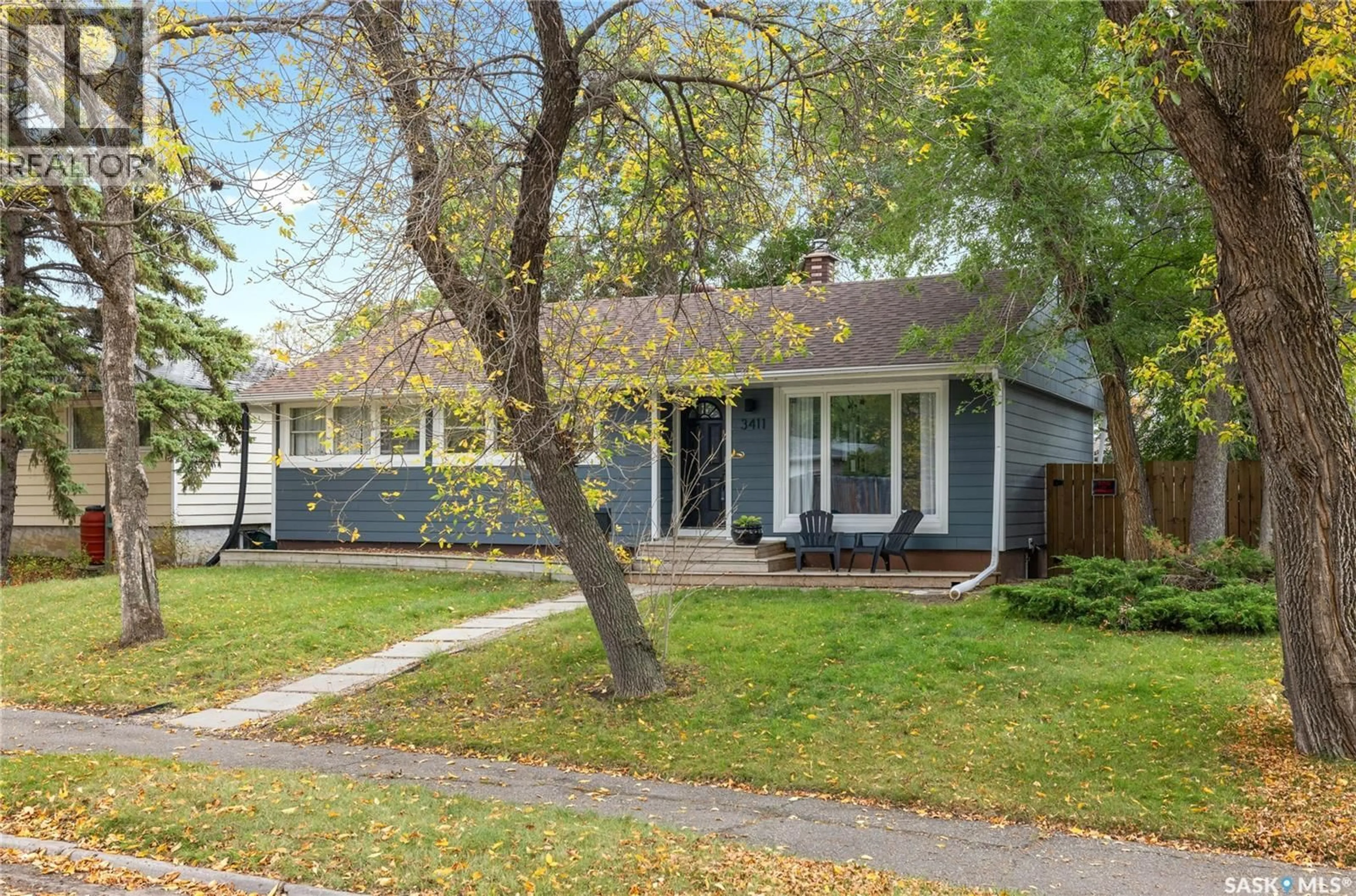 Home with vinyl exterior material, street for 3411 21ST AVENUE, Regina Saskatchewan S4S0T8