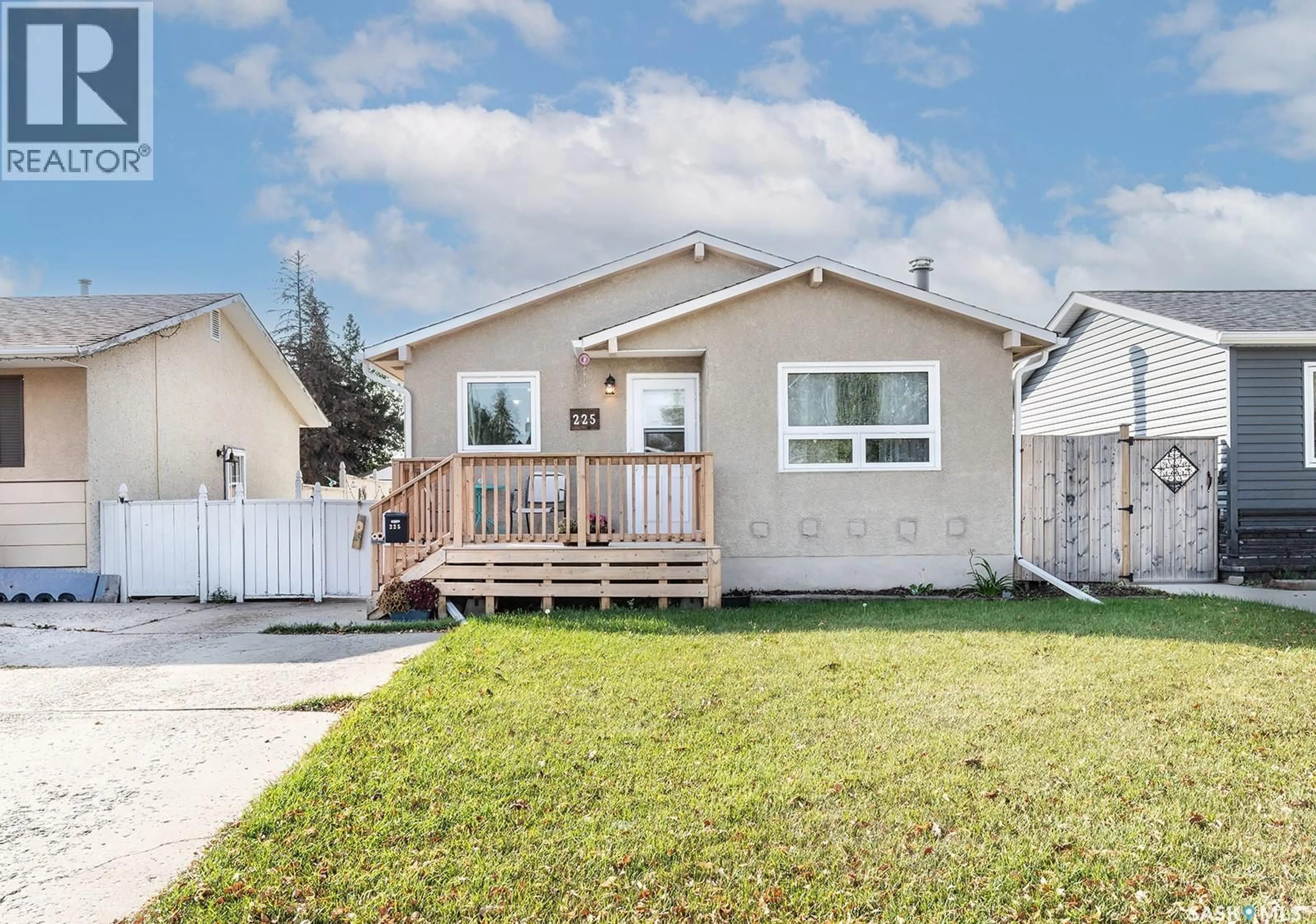 Home with vinyl exterior material, street for 225 CARTIER CRESCENT, Saskatoon Saskatchewan S7L4M1