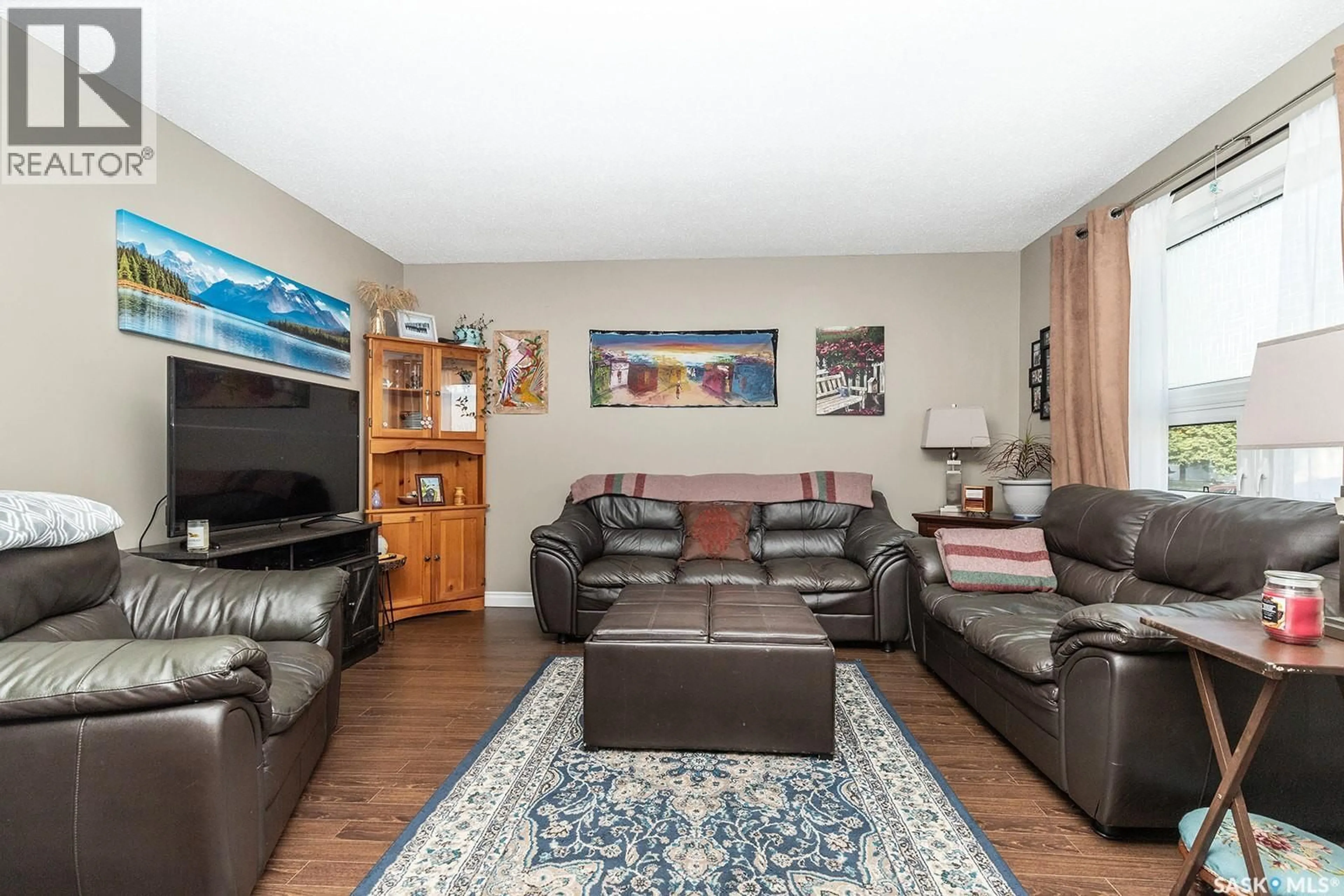 Living room with furniture, unknown for 225 CARTIER CRESCENT, Saskatoon Saskatchewan S7L4M1