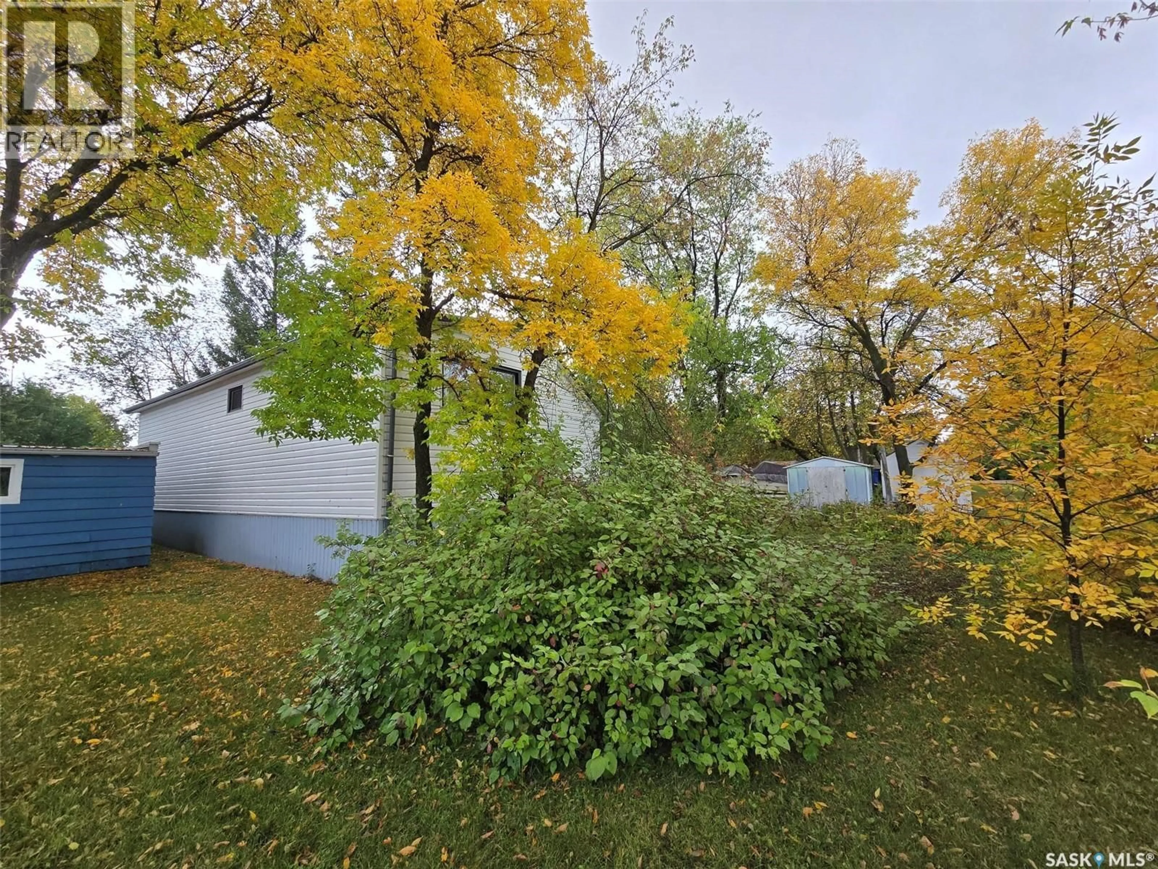 A pic from outside/outdoor area/front of a property/back of a property/a pic from drone, forest/trees view for 914 PACIFIC STREET, Grenfell Saskatchewan S0G2B0