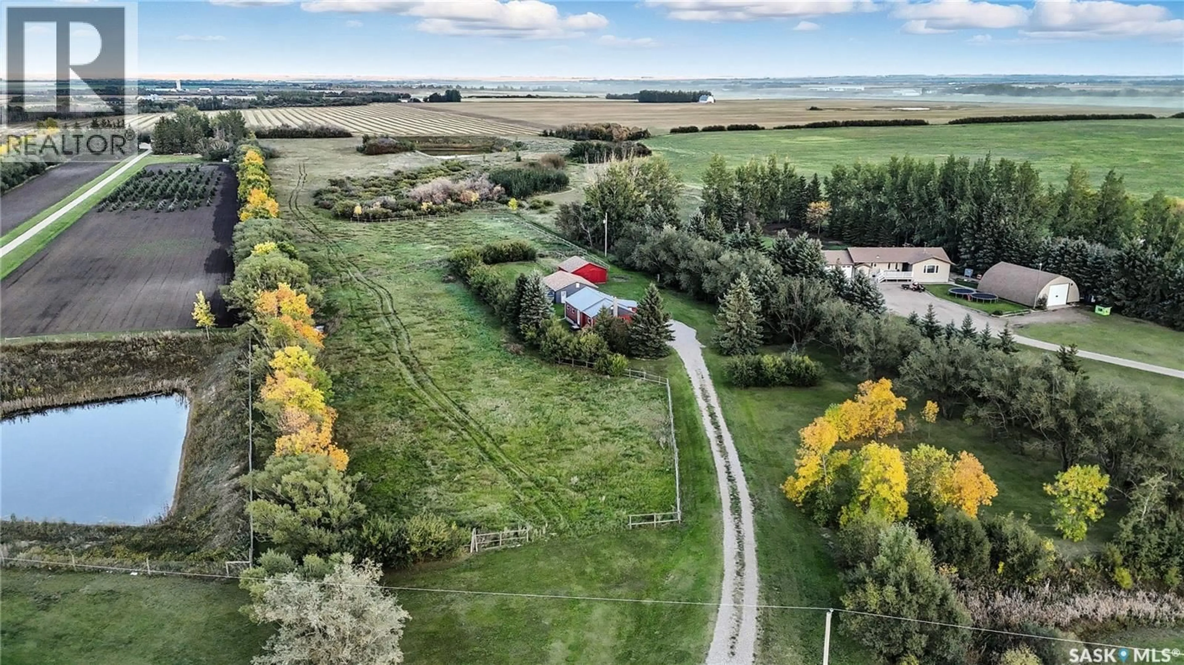 A pic from outside/outdoor area/front of a property/back of a property/a pic from drone, unknown for WOLLF ACREAGE, Corman Park Rm No. 344 Saskatchewan S0K3A0