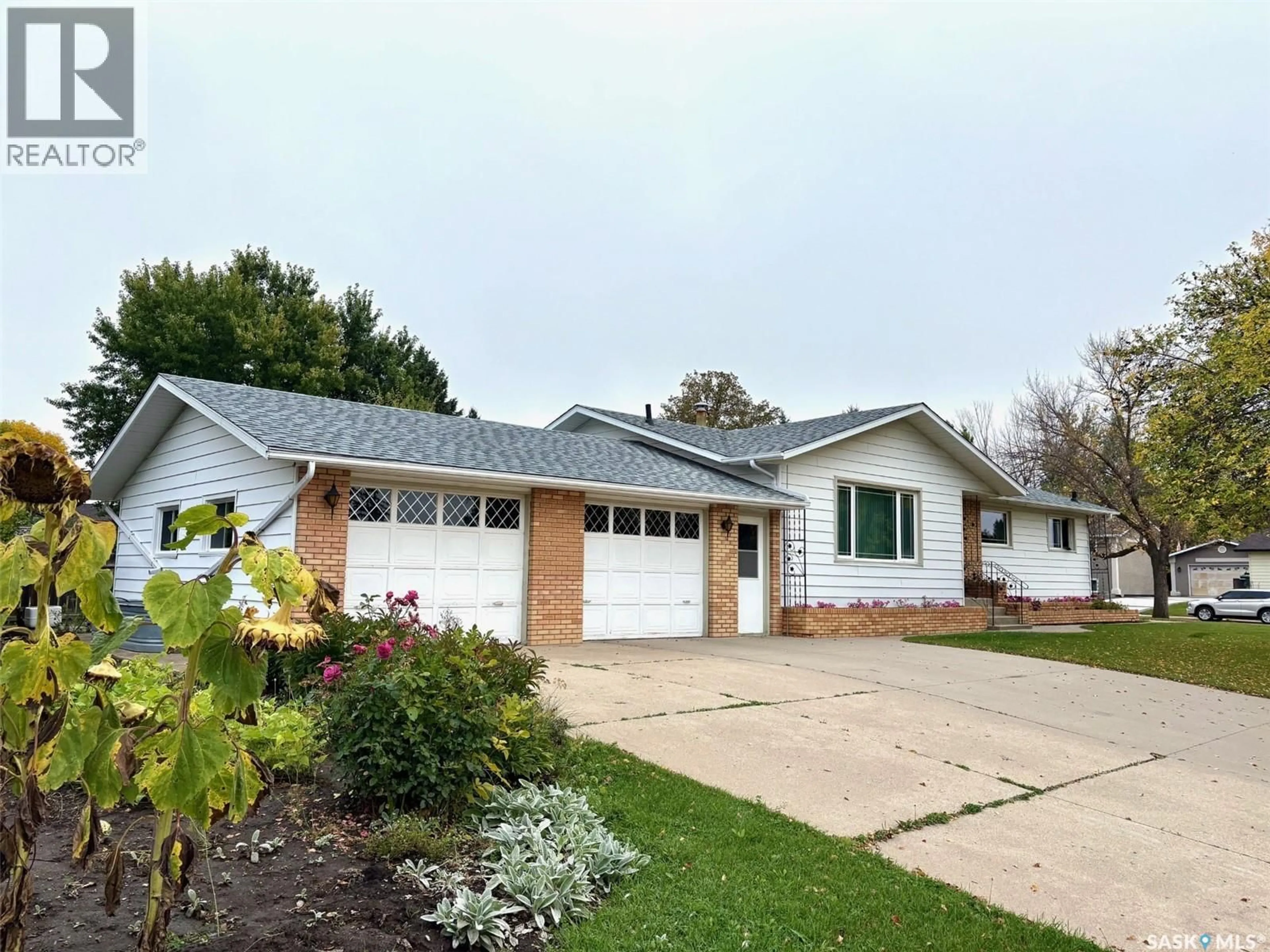 Home with vinyl exterior material, street for 38 ROSEFIELD DRIVE, Yorkton Saskatchewan S3N2R4