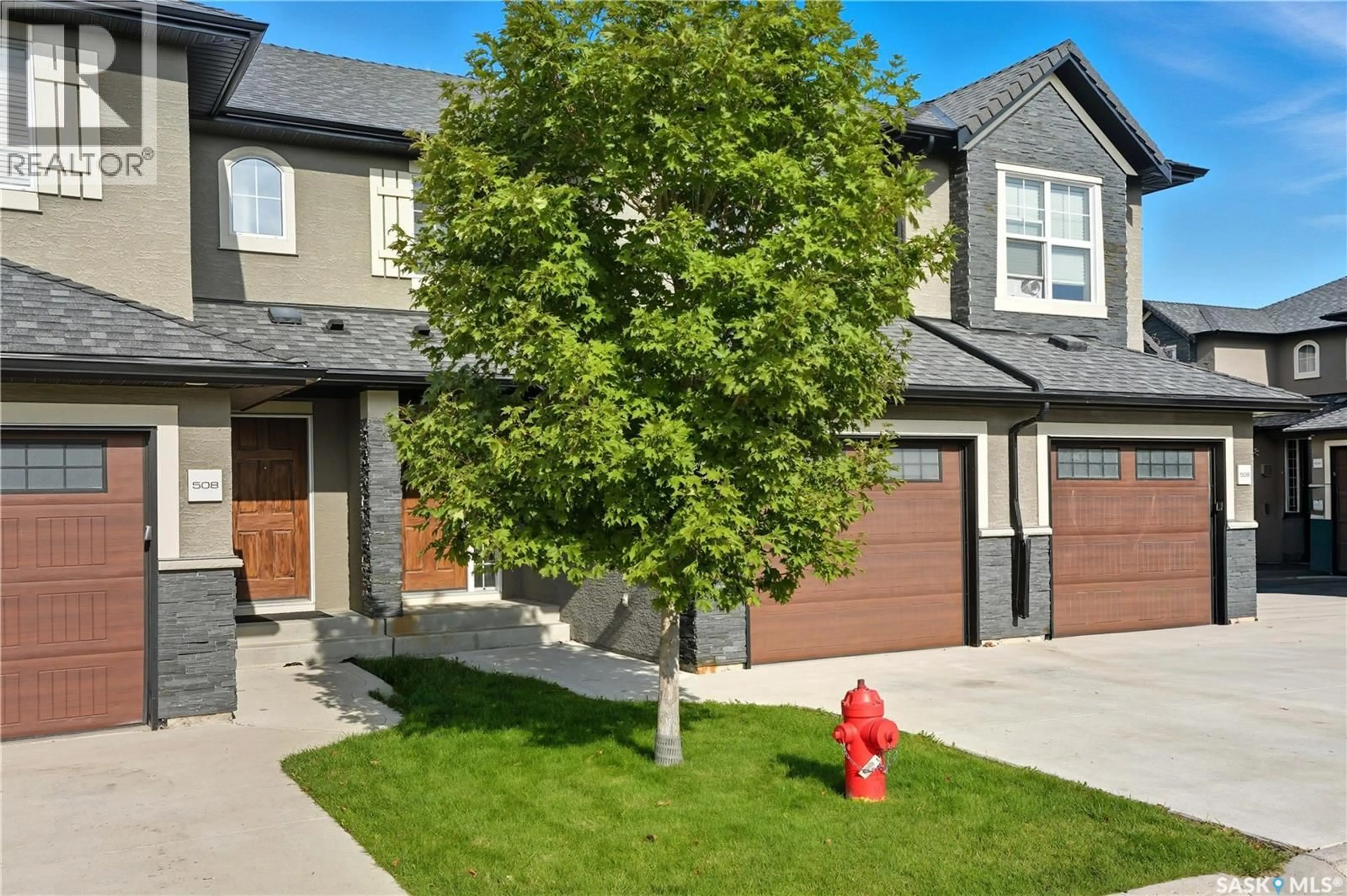 Home with brick exterior material, street for 507 455 REMPEL LANE, Saskatoon Saskatchewan S7T0R9