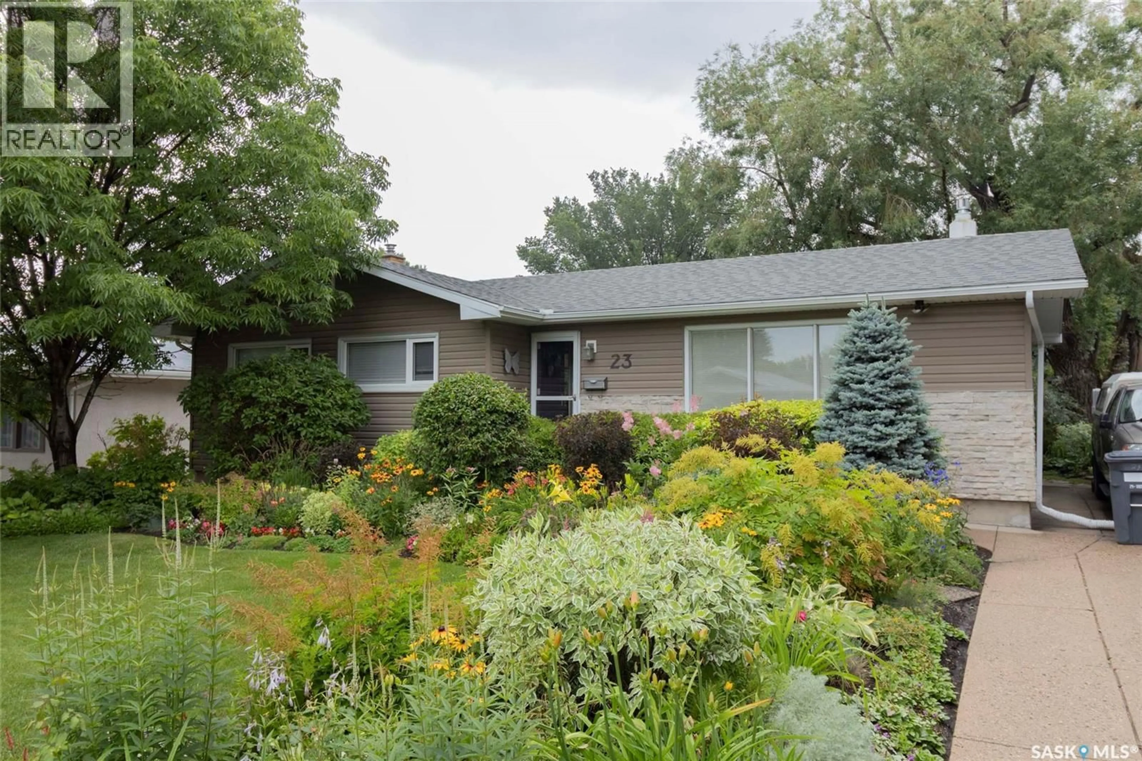 Home with vinyl exterior material, street for 23 BALDWIN CRESCENT, Saskatoon Saskatchewan S7H3M5