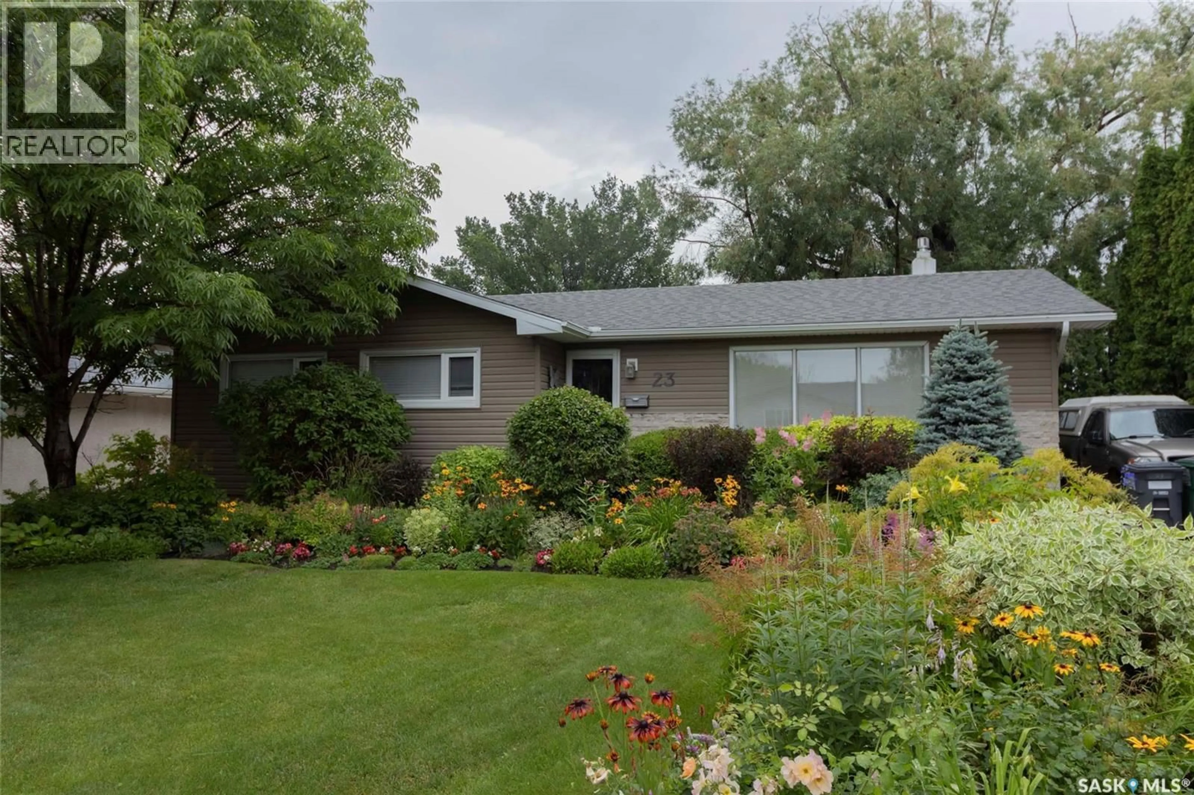 Home with vinyl exterior material, street for 23 BALDWIN CRESCENT, Saskatoon Saskatchewan S7H3M5