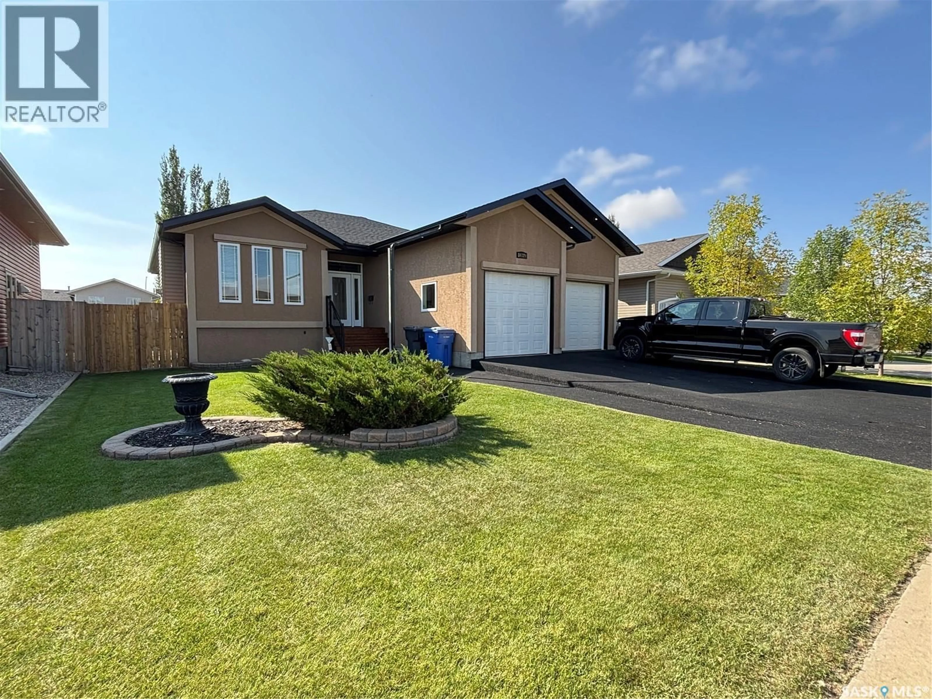 A pic from outside/outdoor area/front of a property/back of a property/a pic from drone, street for 10320 MAHER DRIVE, North Battleford Saskatchewan S9A0J1